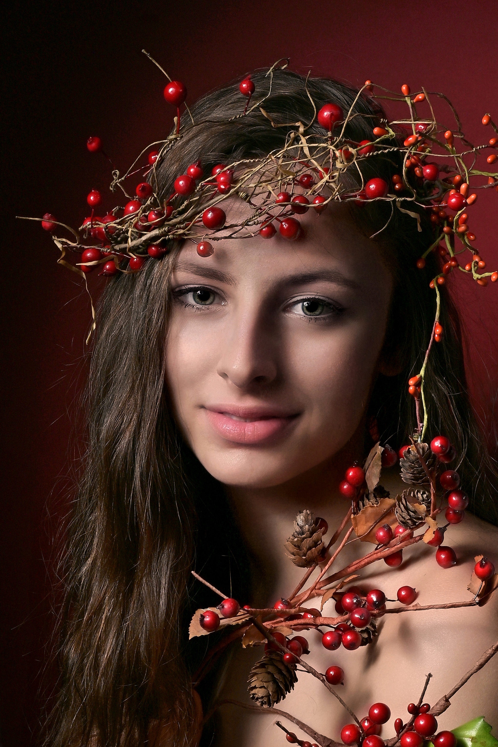 Woman with a crown of berries and pinecones HD Phone Wallpaper
