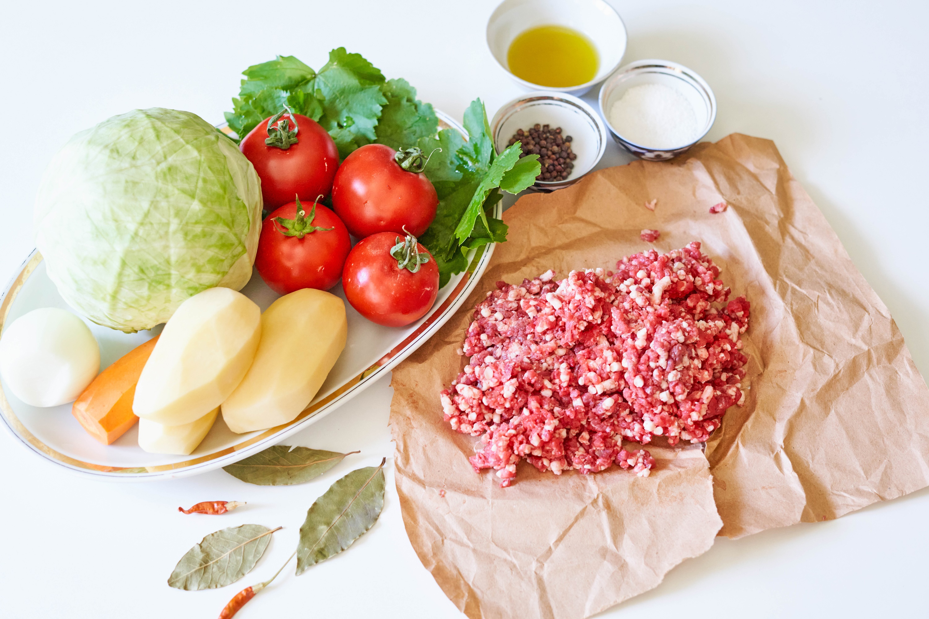 Ingredients for cooking: minced meat, vegetables, spices, and oil HD Wallpaper