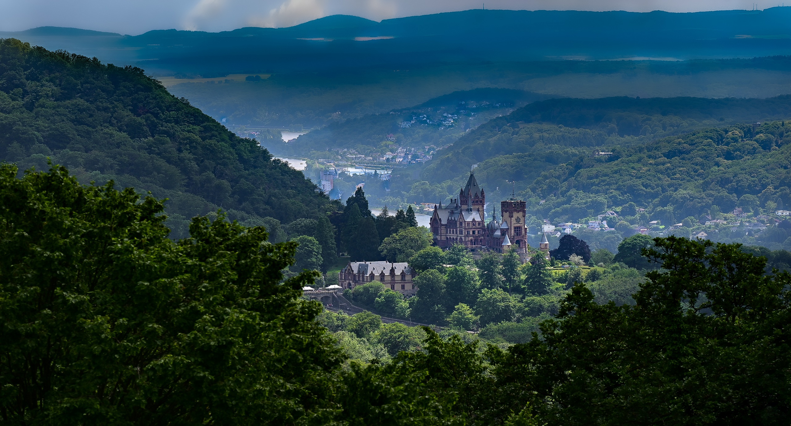 Drachenburg Castle in Germany with Mountains and Trees HD Wallpaper