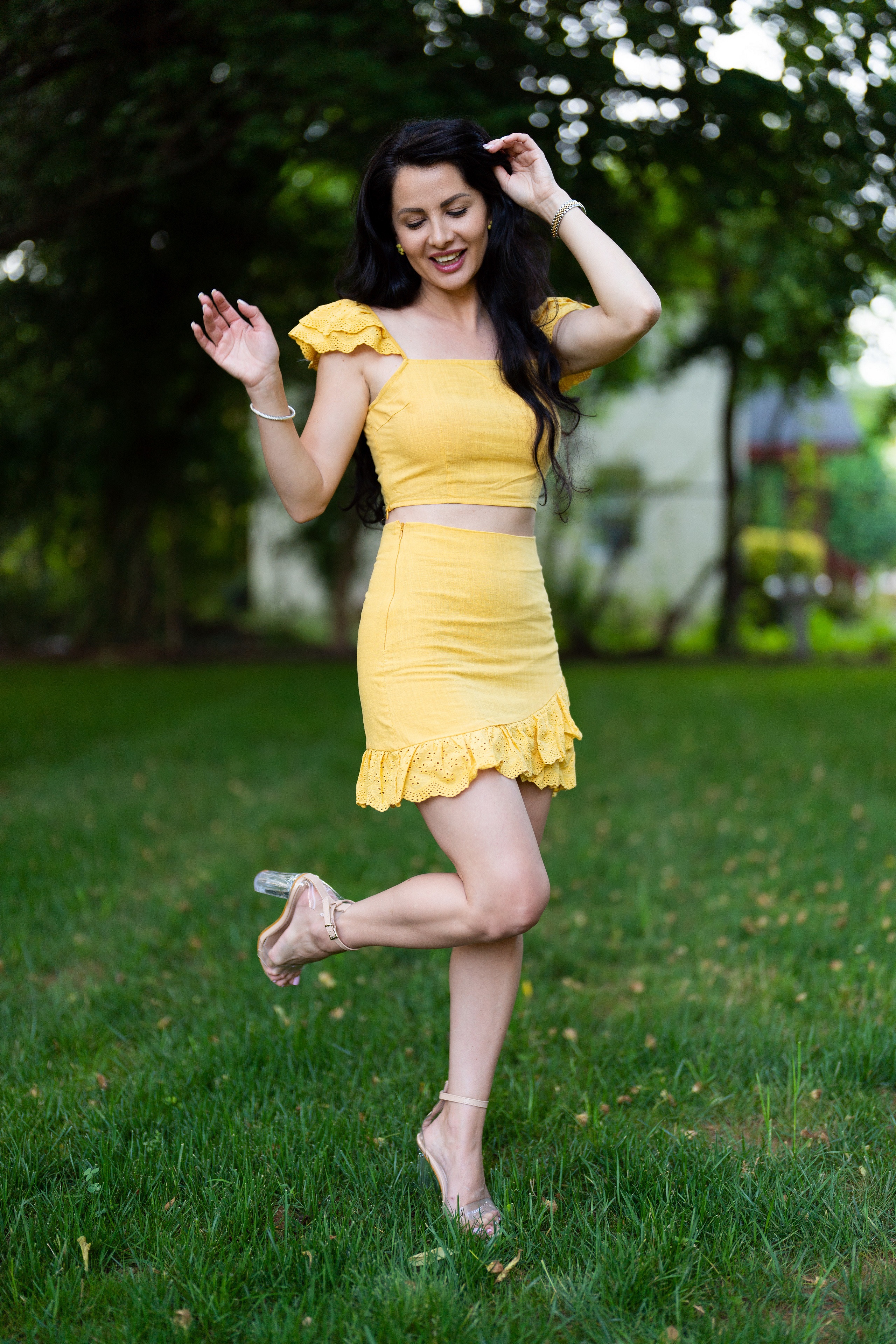 Victoria Bell posing in a yellow outfit outdoors HD Phone Wallpaper