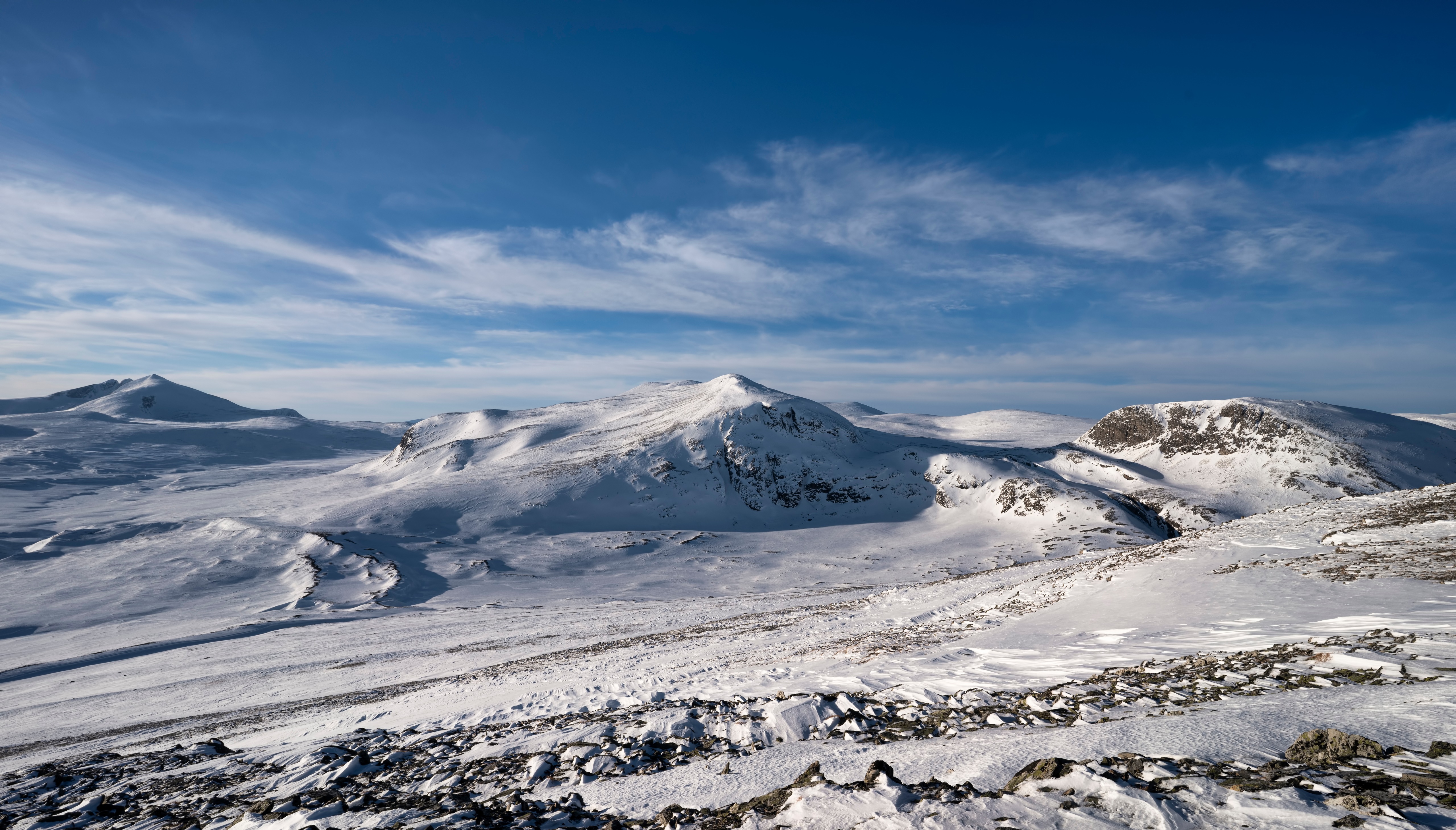 Snowy mountains in Dovrefjell National Park, Norway HD Wallpaper