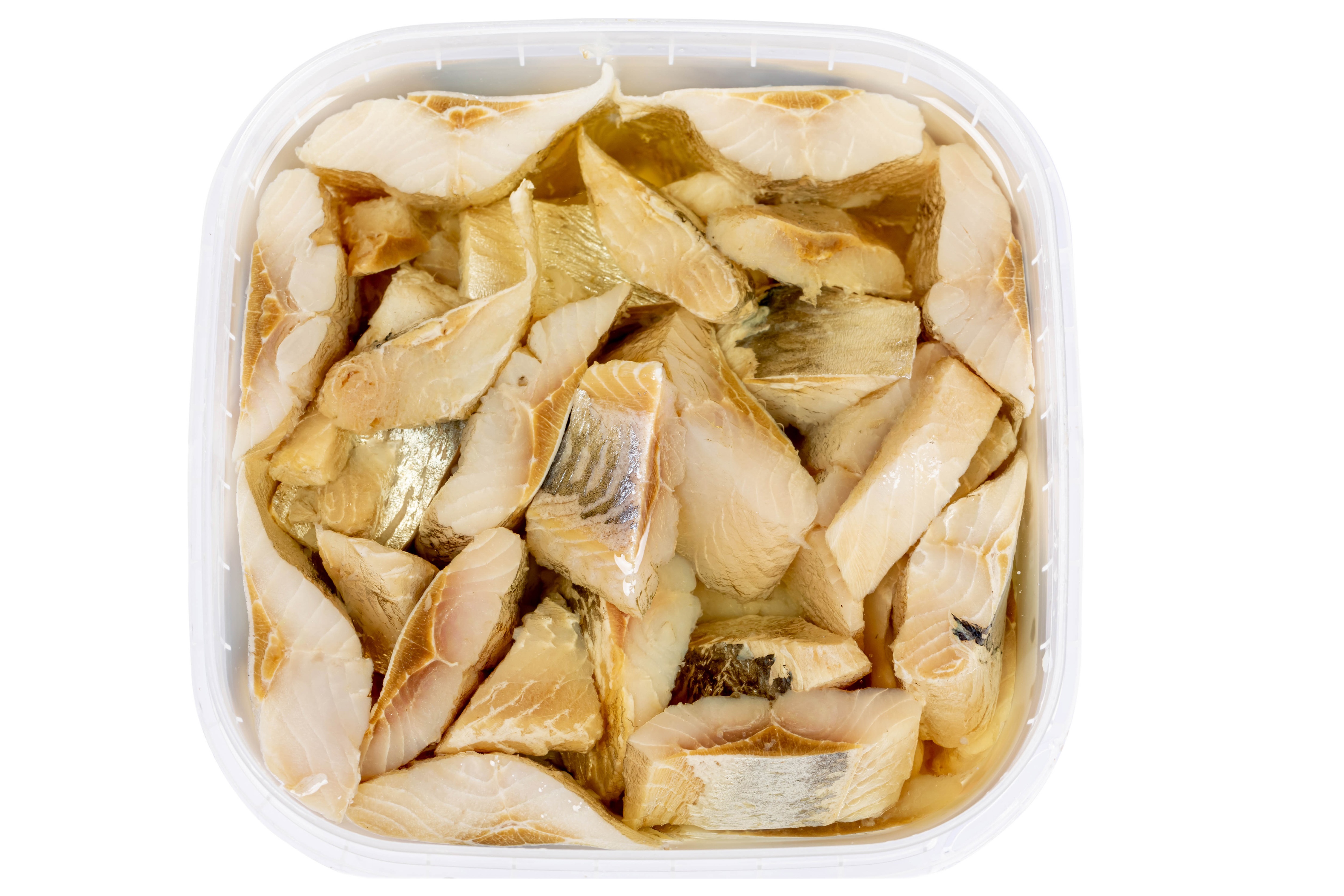 Pieces of fish in a plastic container HD Wallpaper