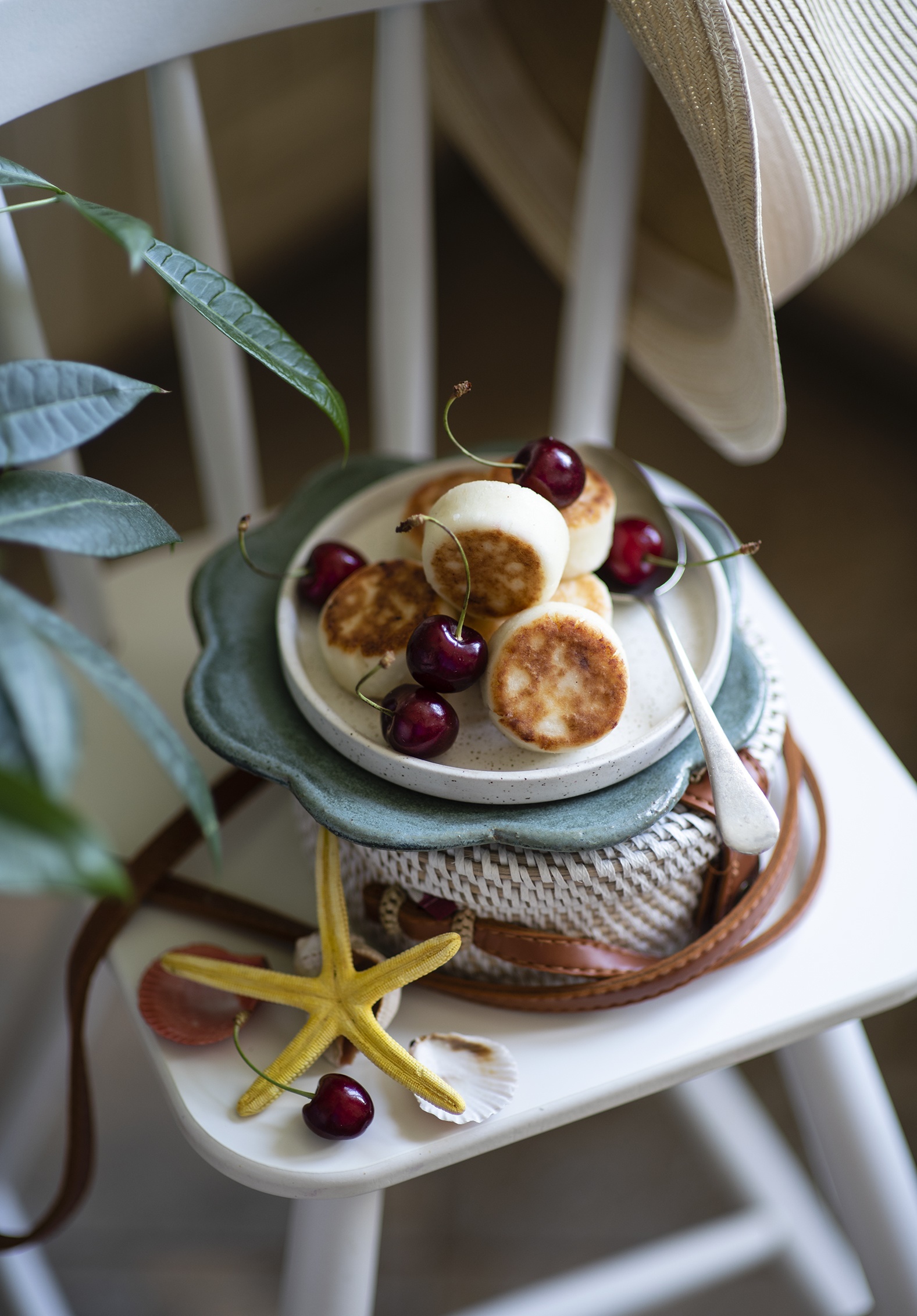 Syrniki with cherries on a chair HD Phone Wallpaper