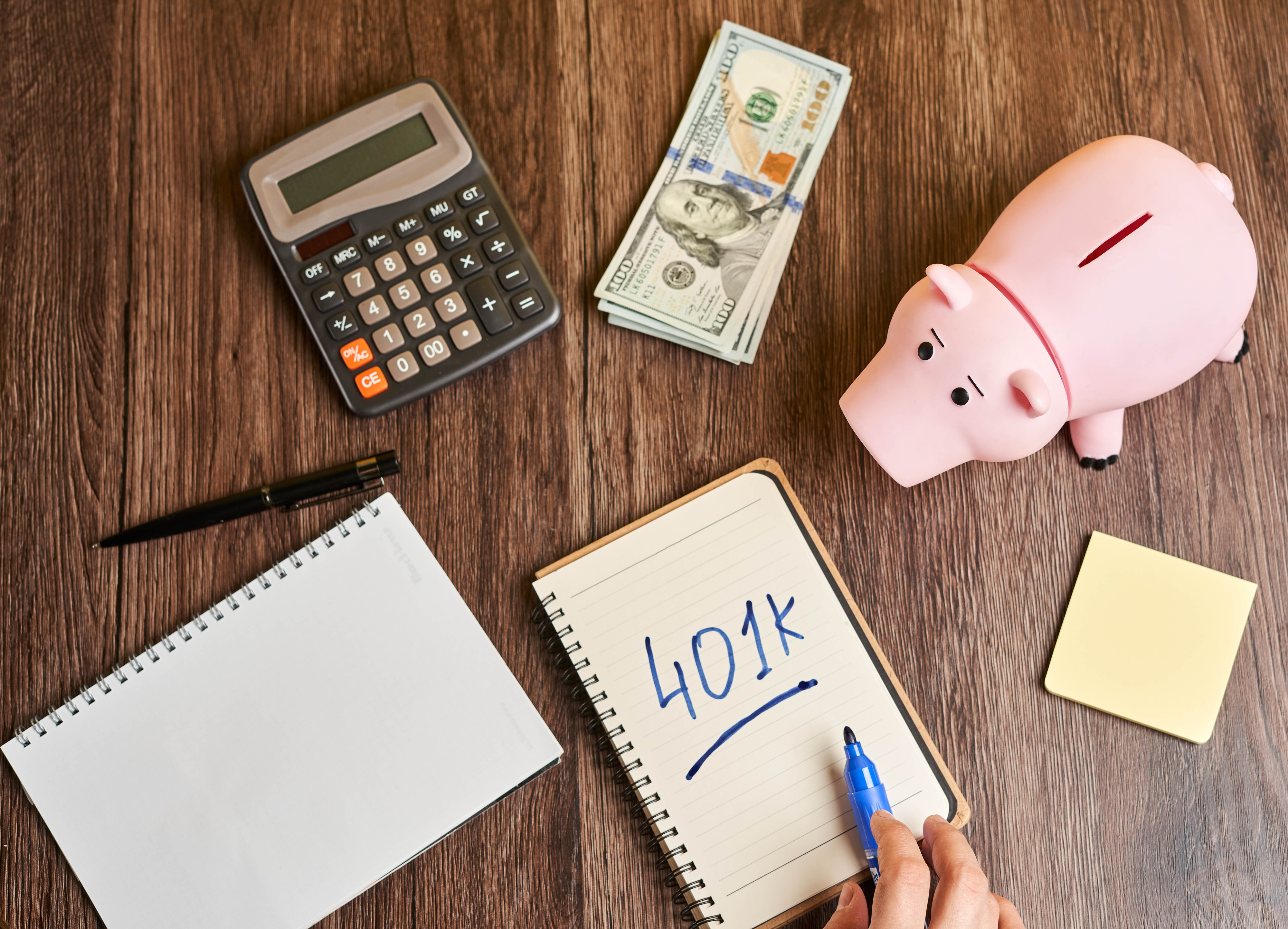 401k savings with calculator and piggy bank HD Wallpaper