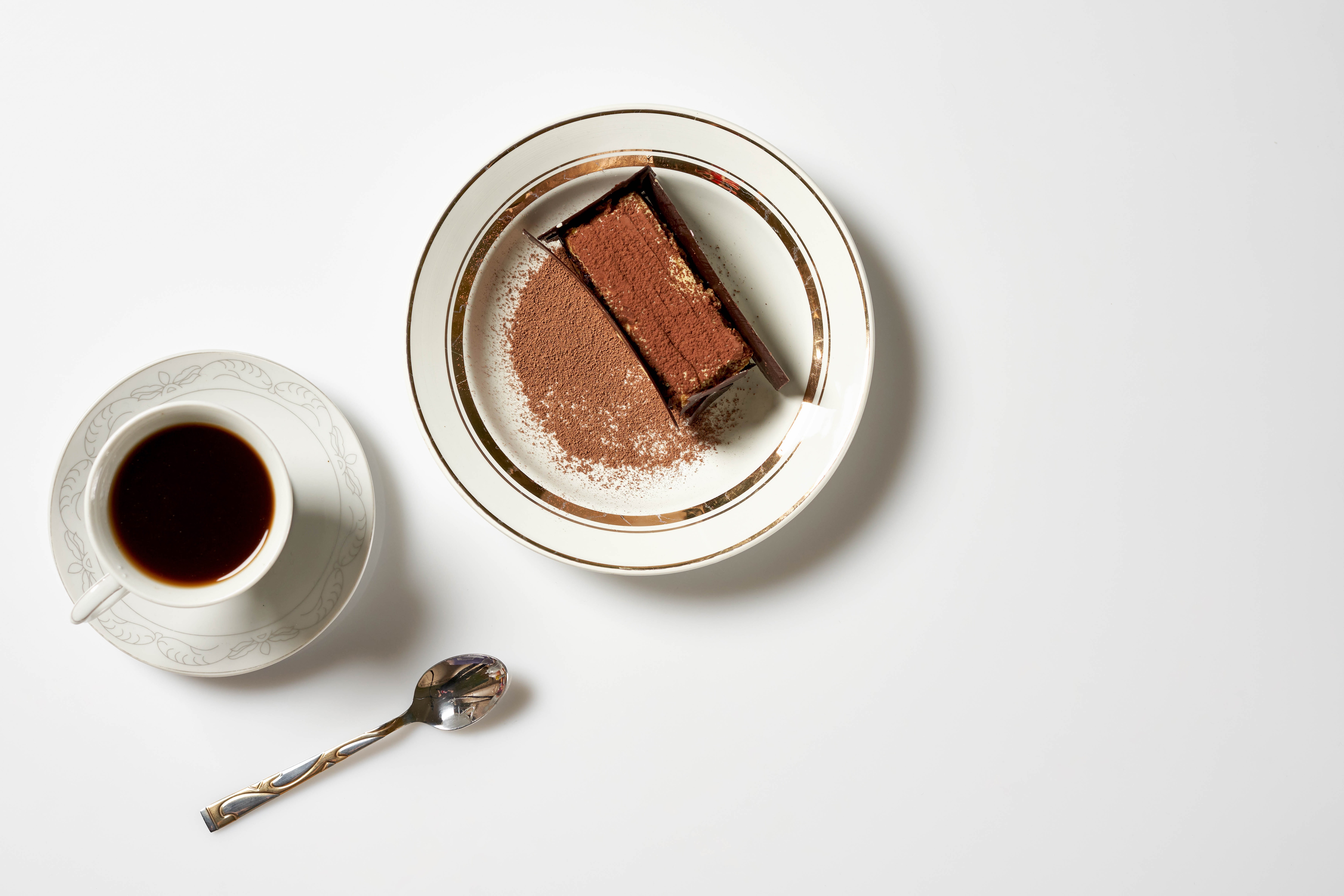 Chocolate cake slice with coffee and spoon HD Wallpaper
