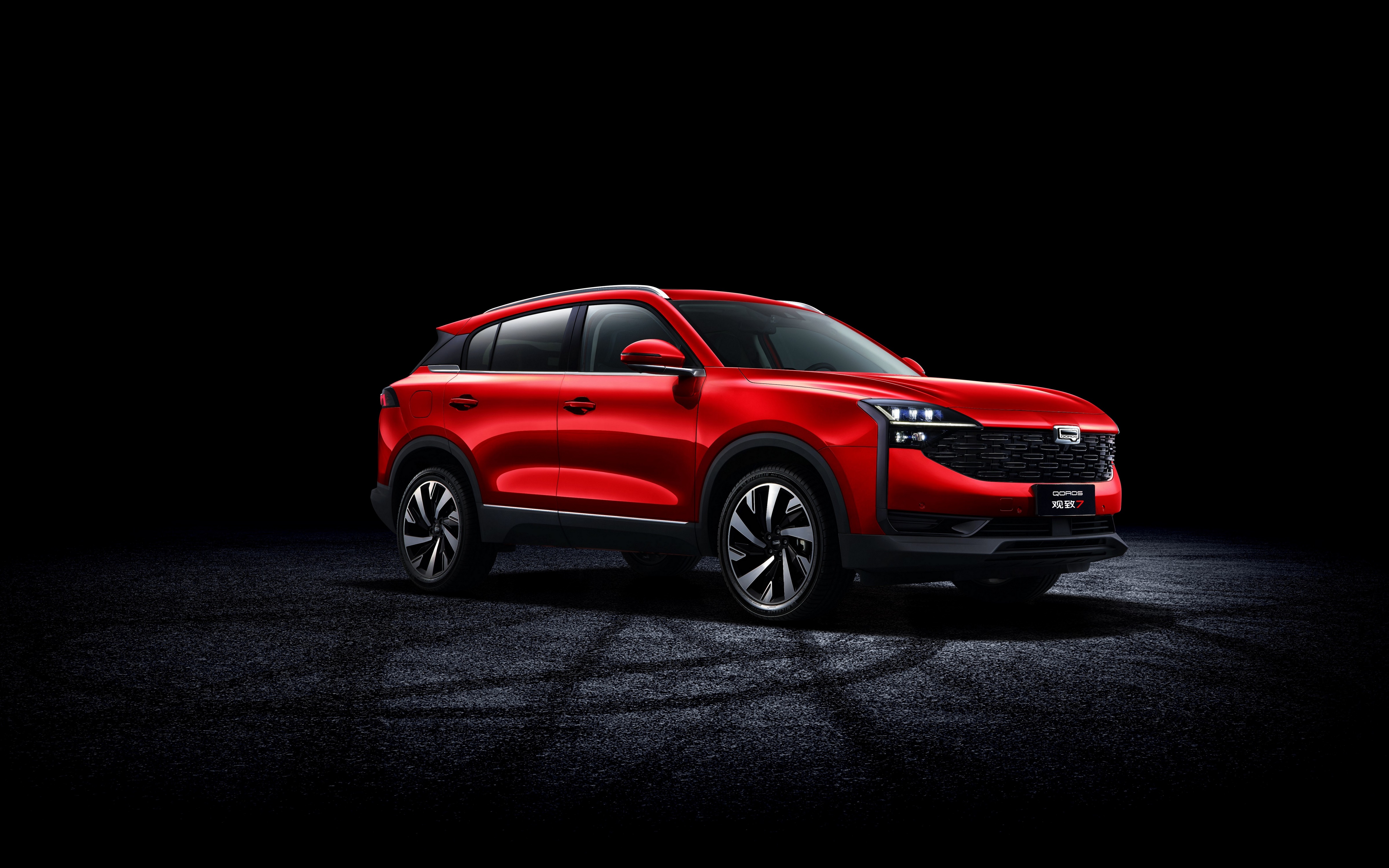 Red Qoros 7 Crossover on Black Background HD Wallpaper