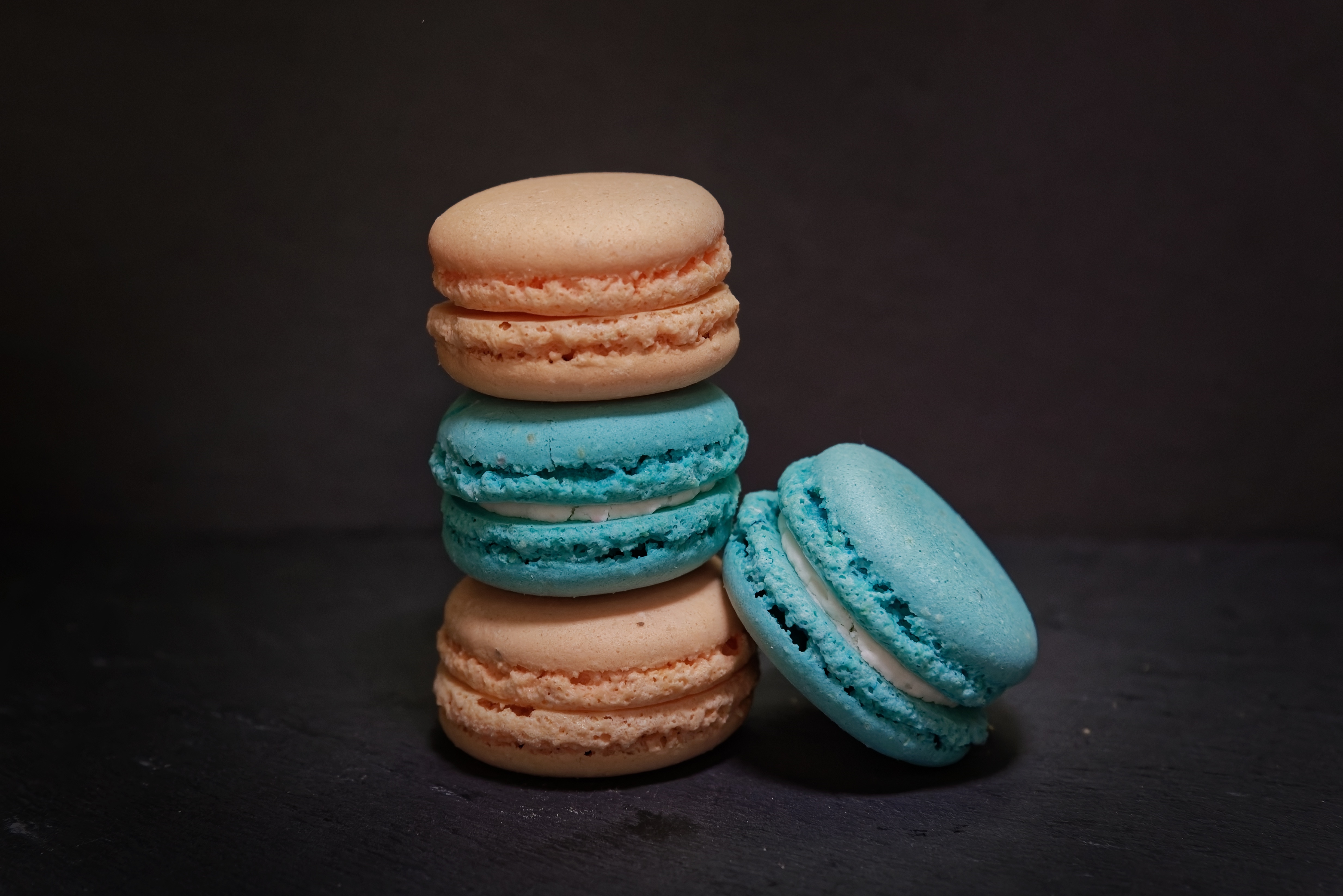Four macarons on a gray background HD Wallpaper