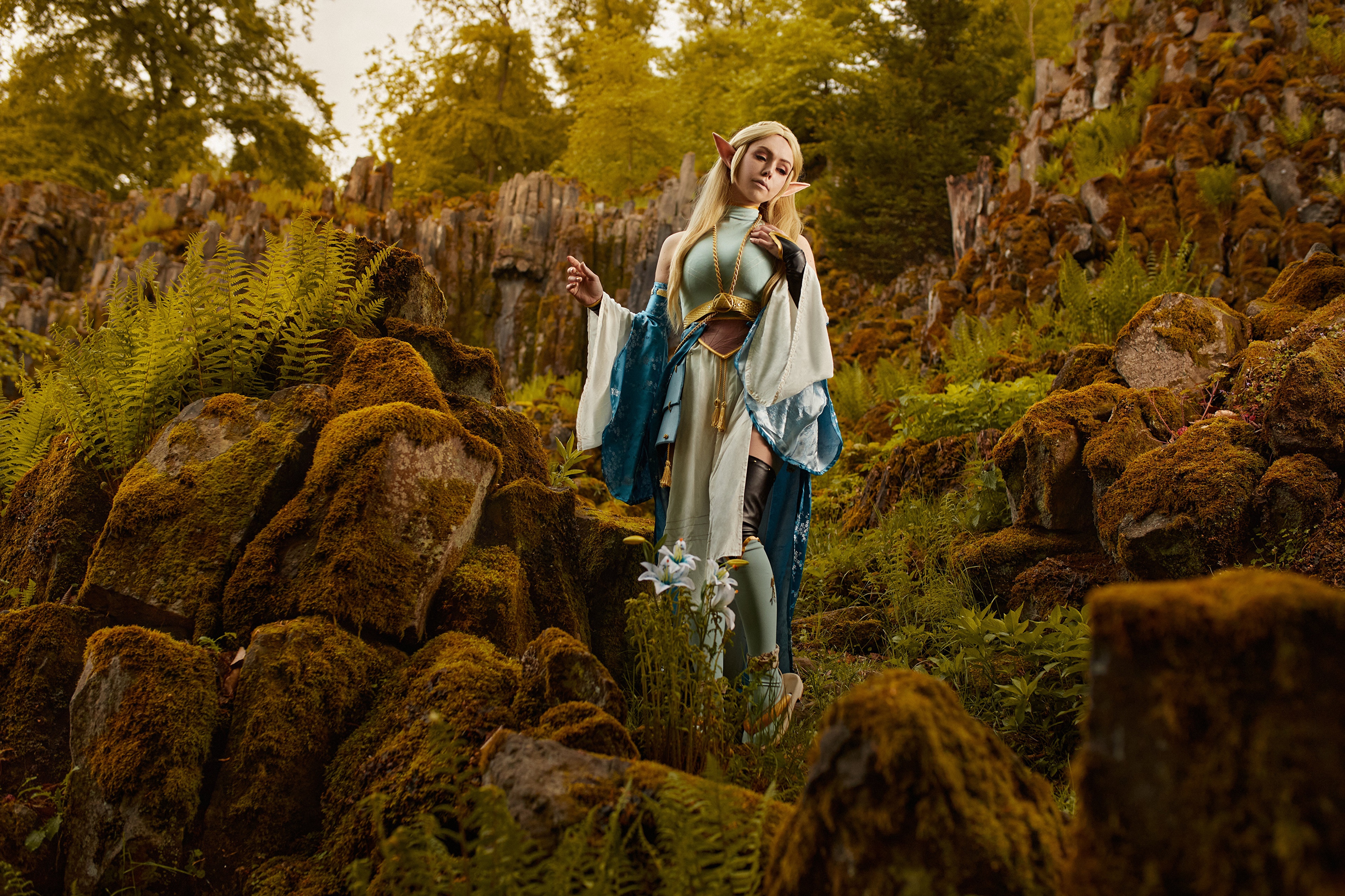 Zelda cosplay in a mossy forest HD Wallpaper