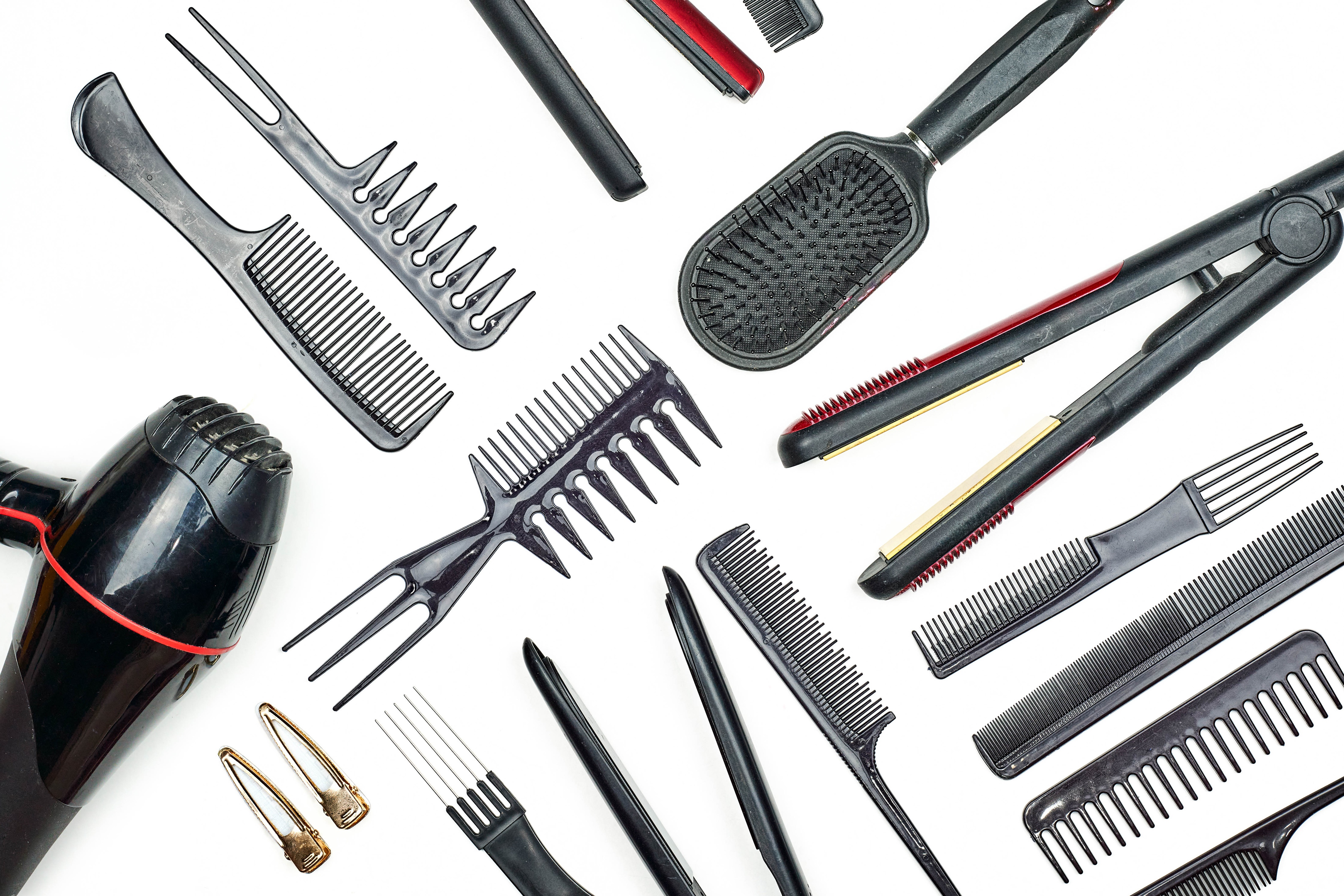 Hair styling tools on white background HD Wallpaper