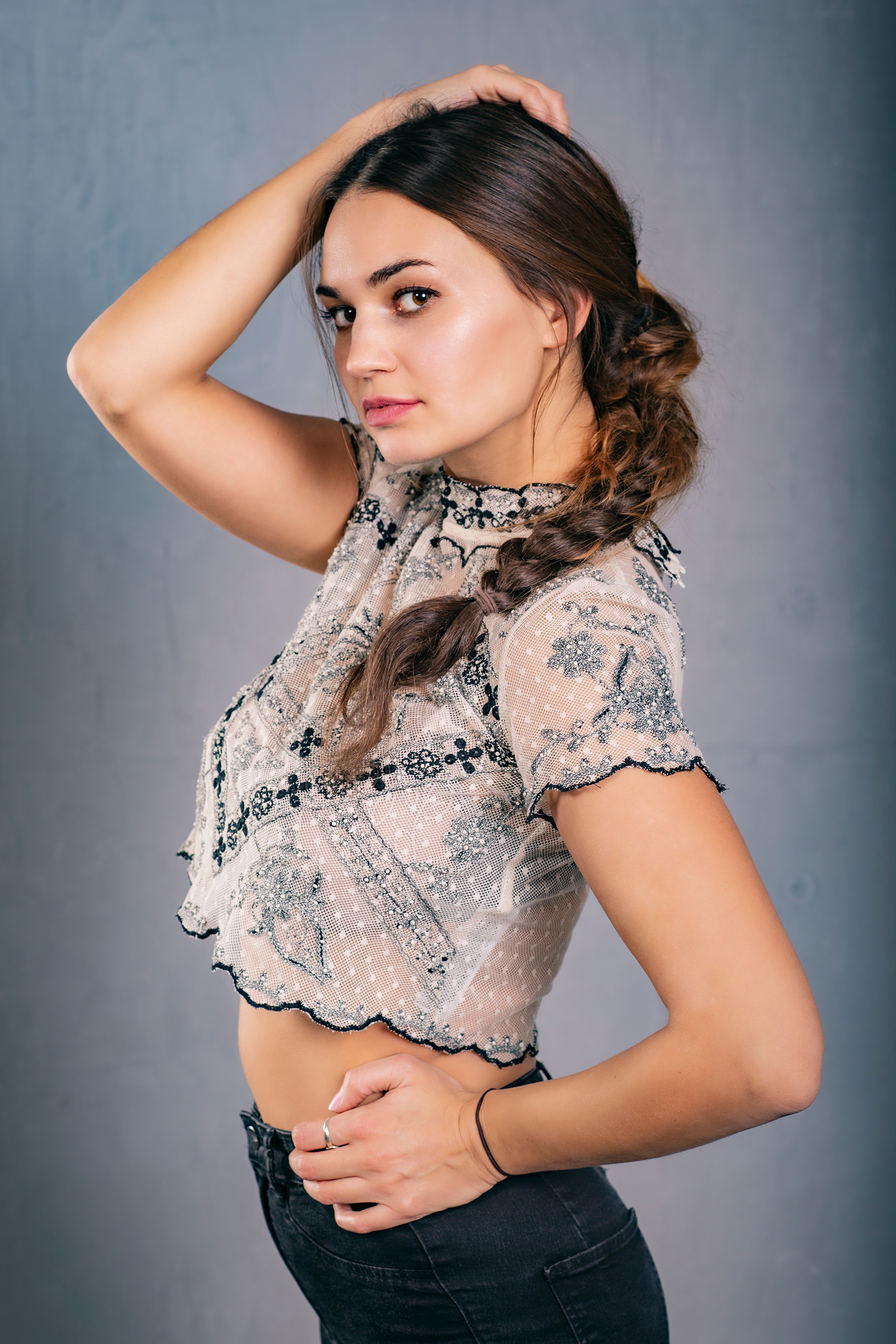 Xenia with braid hair and hands on hips HD Phone Wallpaper