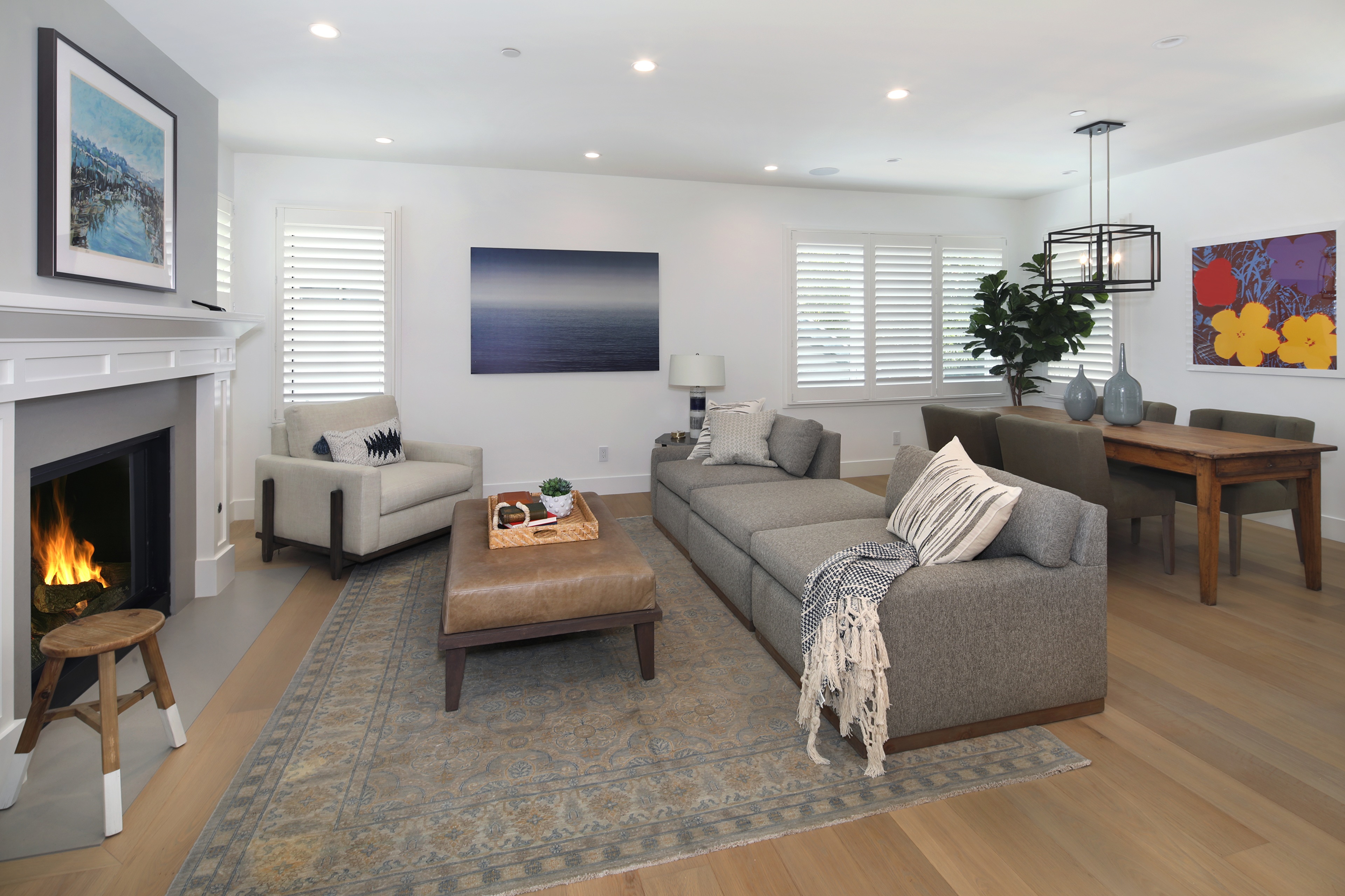Living room with sofa, armchair, and fireplace HD Wallpaper