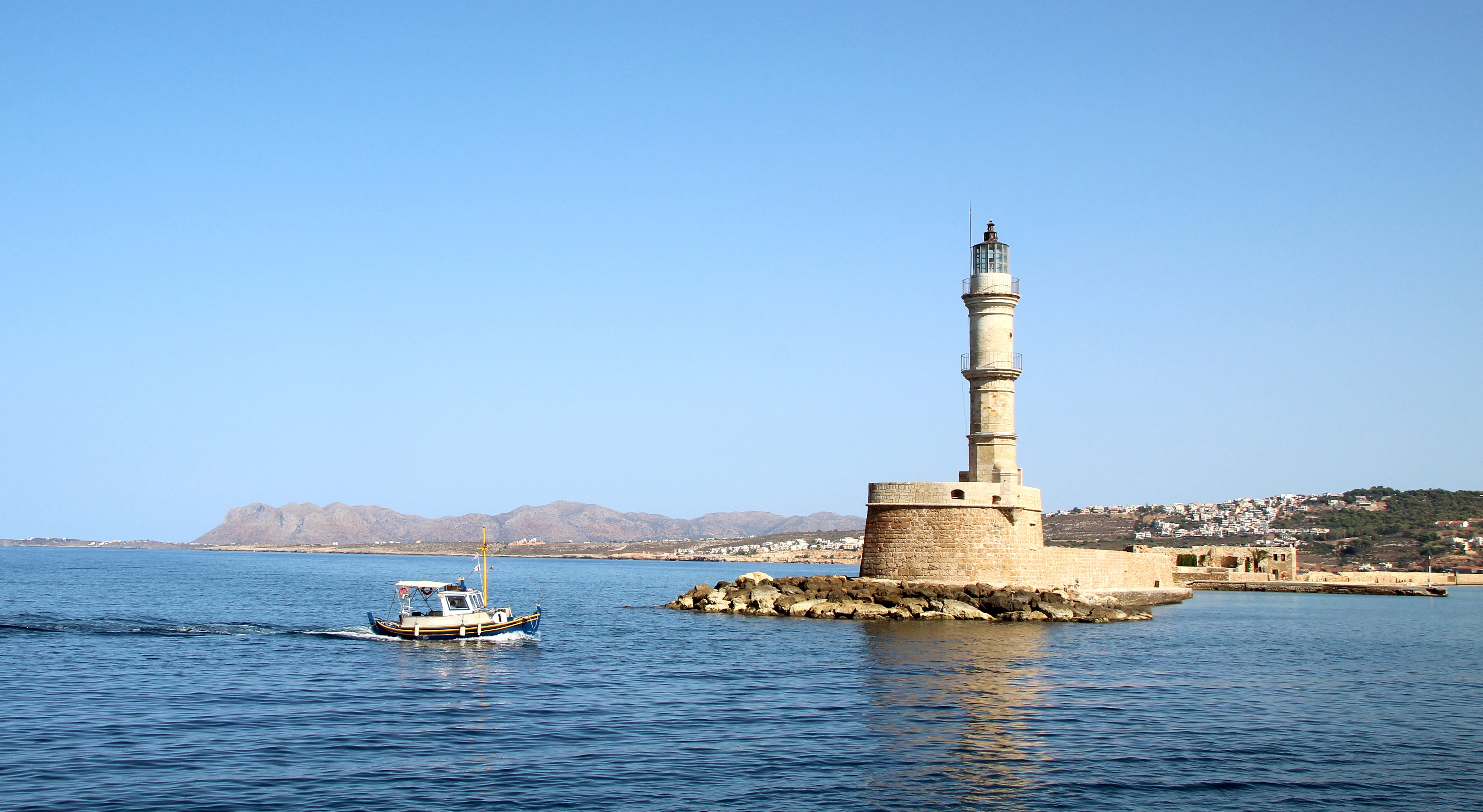 Chania Lighthouse and Motorboat in Crete, Greece HD Wallpaper