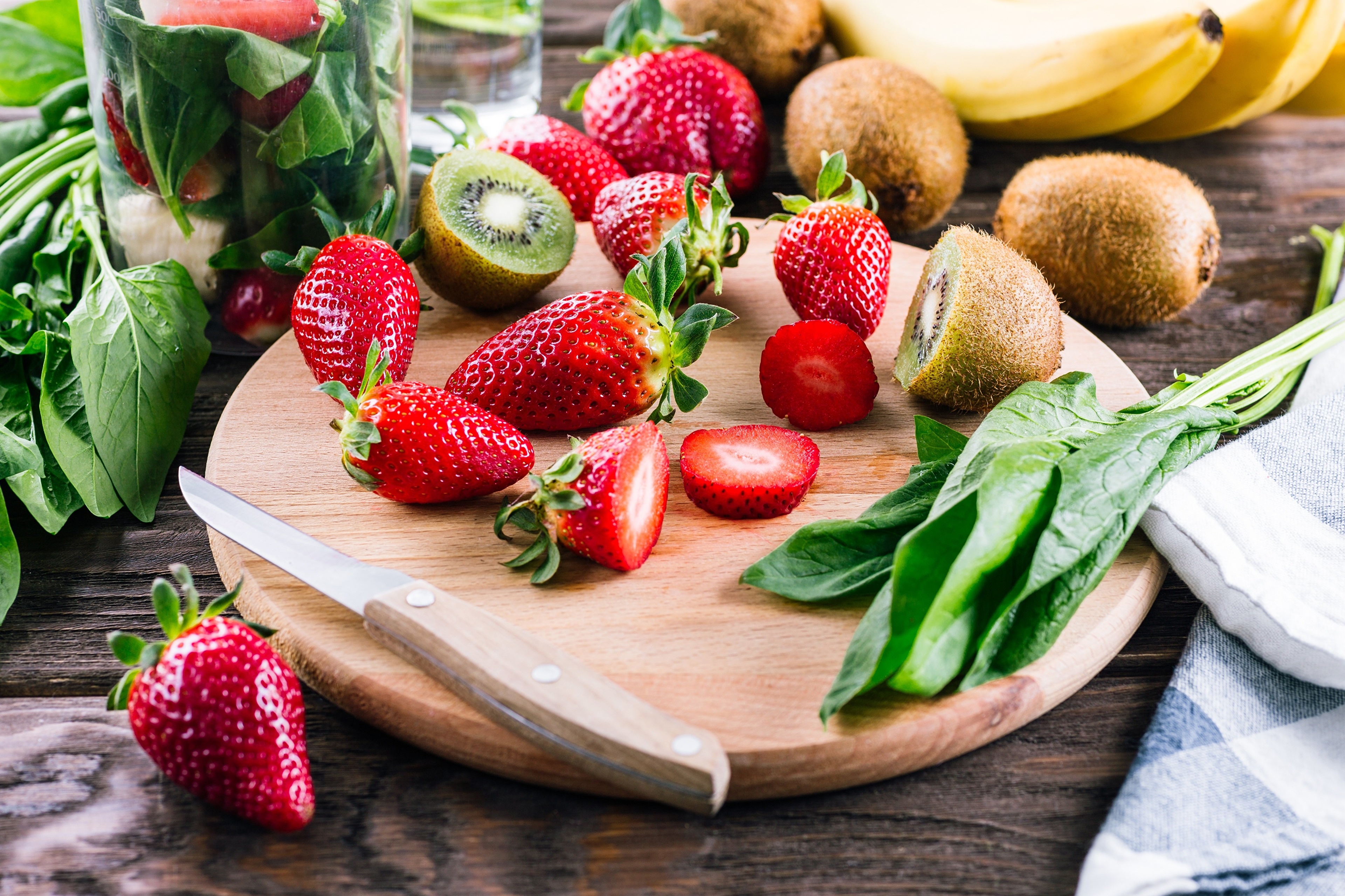 Strawberries, Kiwis, Bananas, Spinach, and Knife on Cutting Board HD Wallpaper
