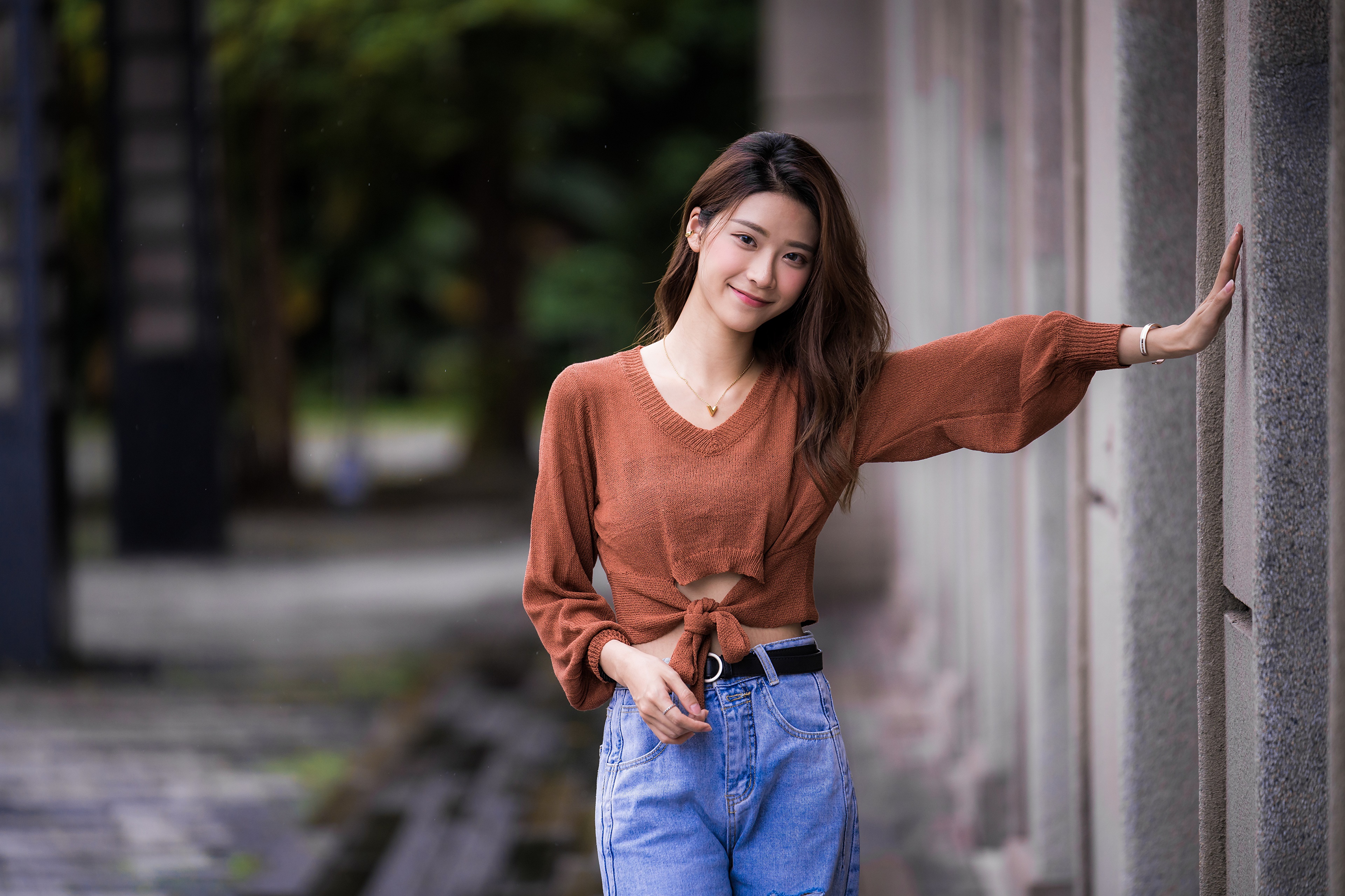 Asian Woman in Sweater and Jeans Posing HD Wallpaper