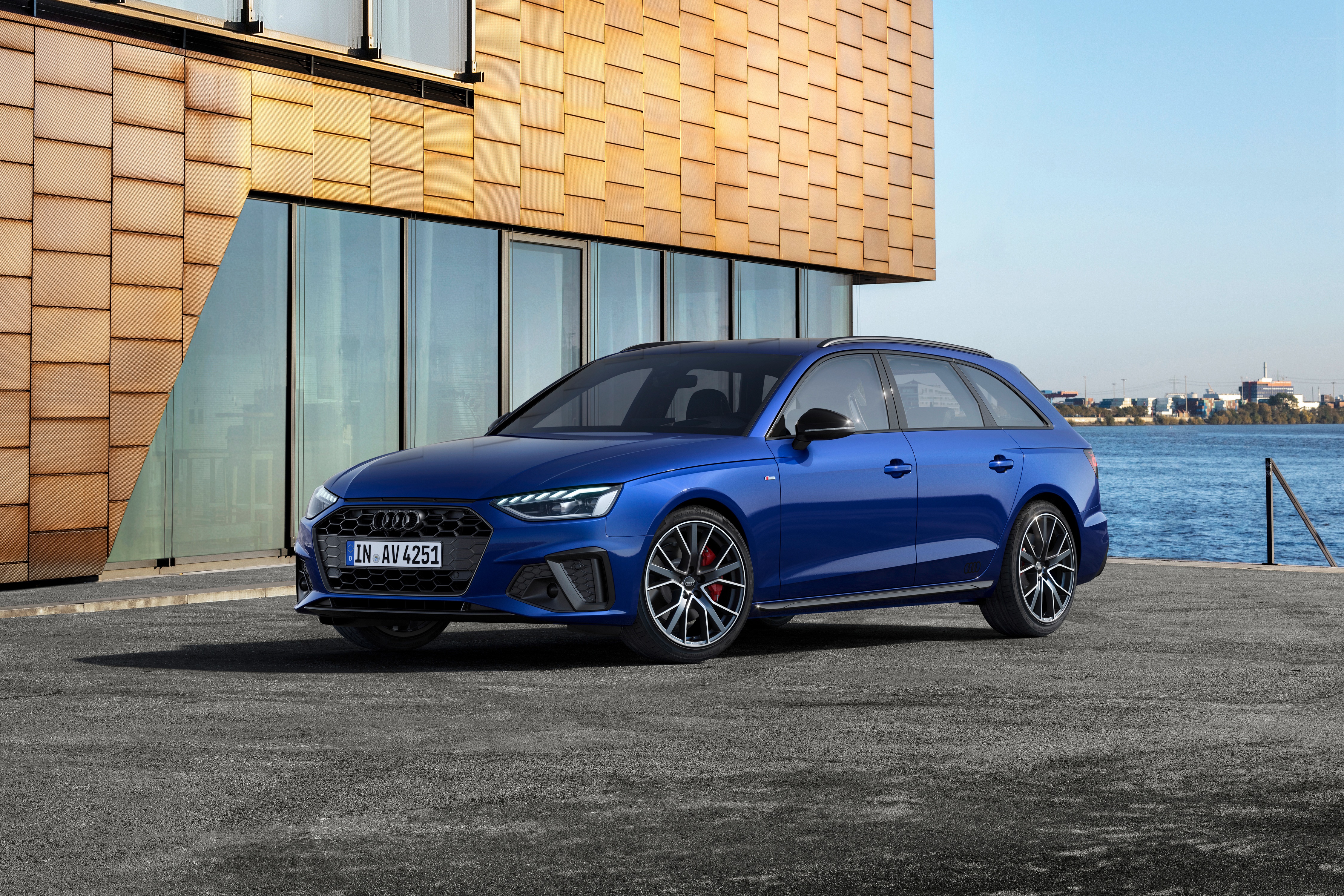 Blue Audi A4 Avant S line competition plus parked by water HD Wallpaper