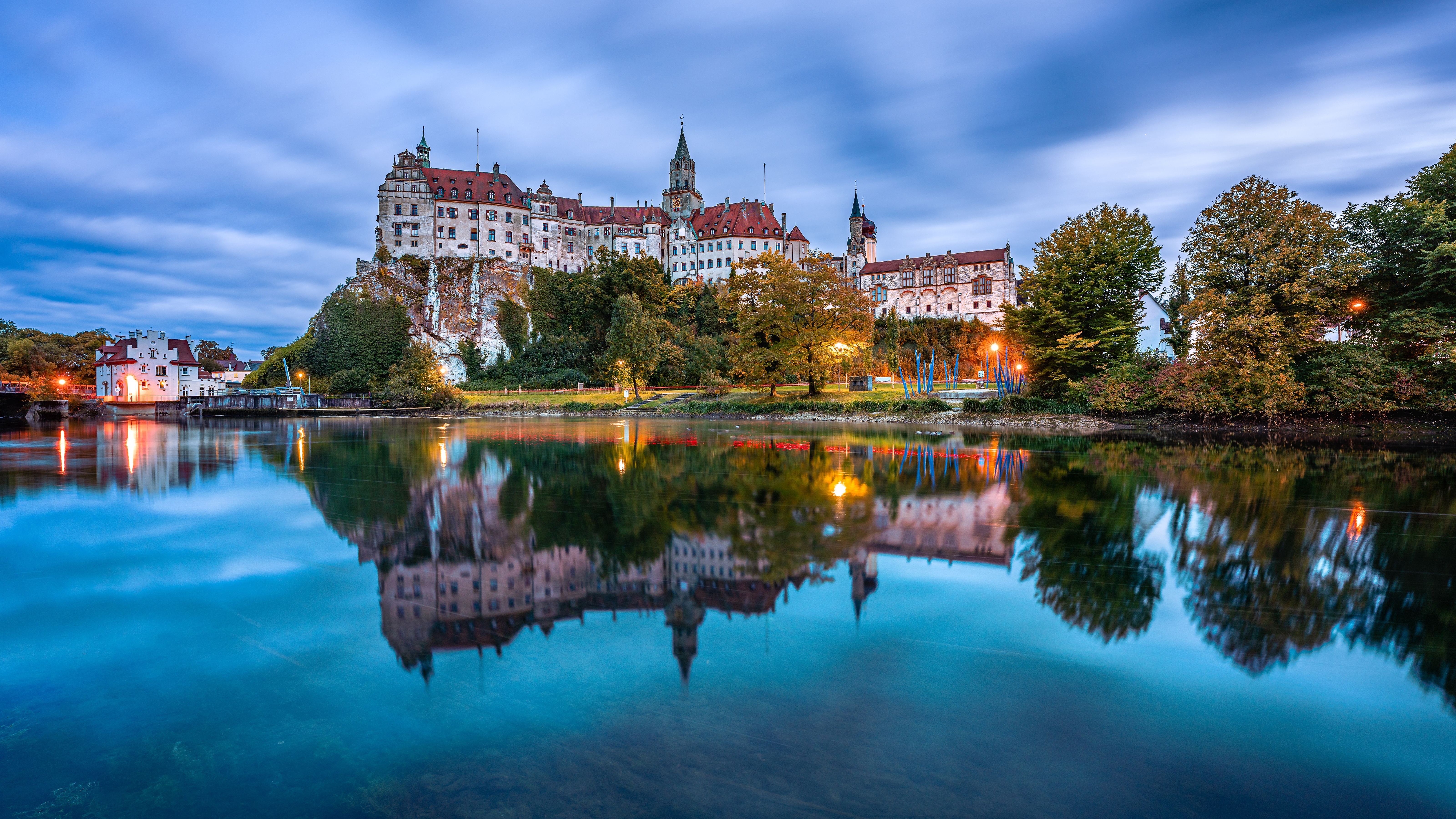 Sigmaringen Castle reflected in a river at dusk HD Wallpaper