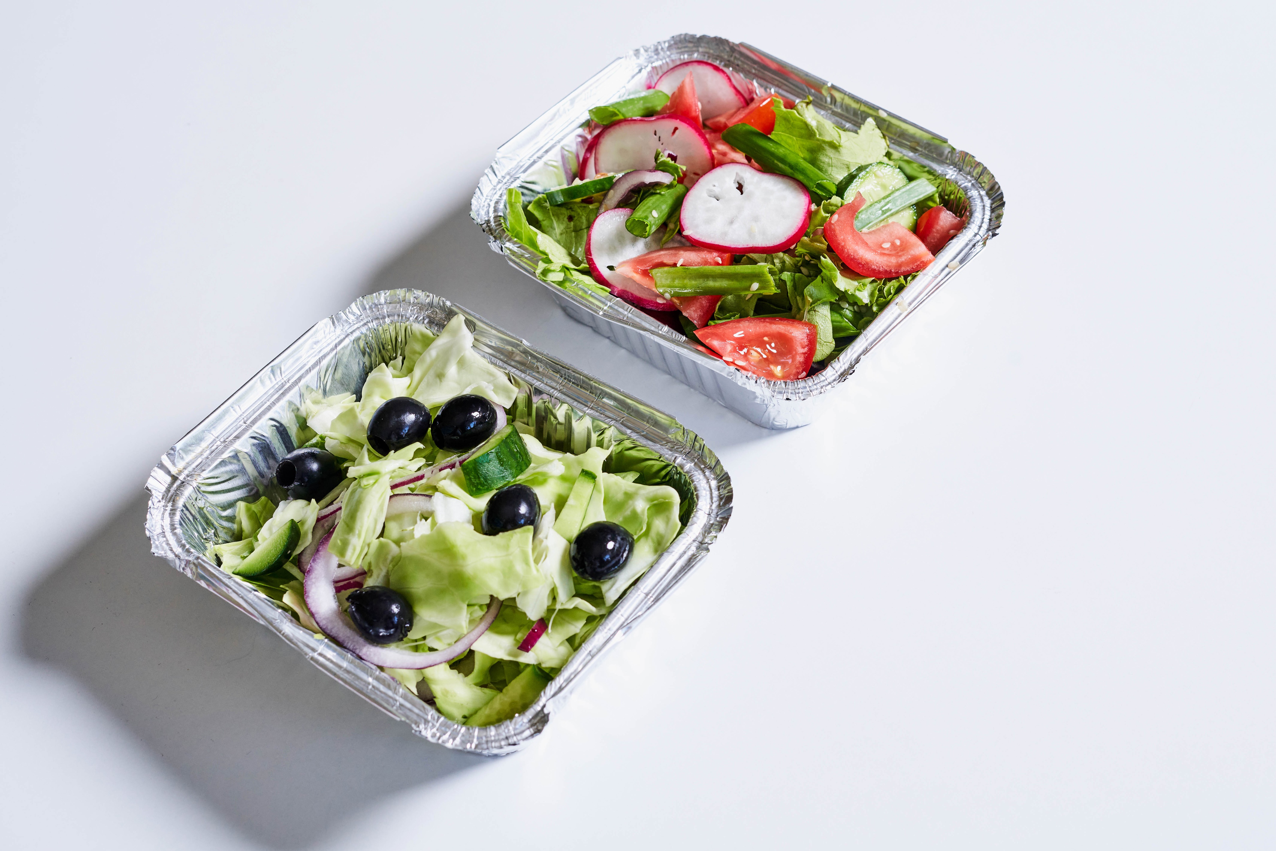 Two salads in aluminum containers HD Wallpaper