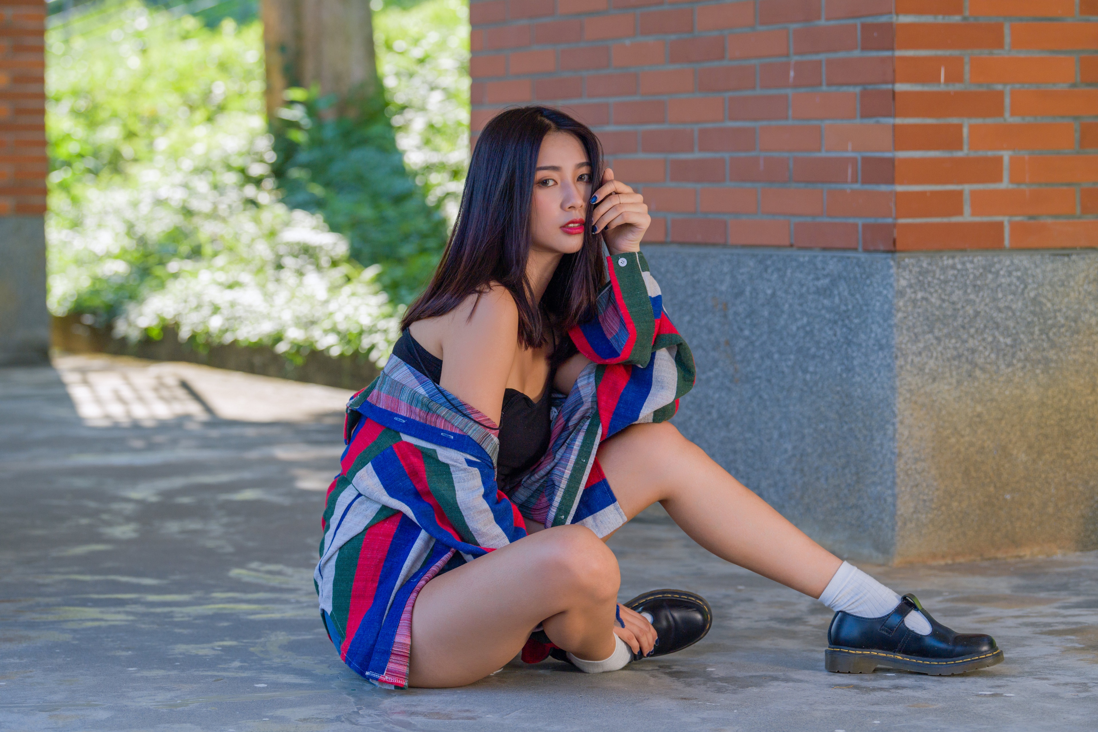 Asian woman sitting outdoors HD Wallpaper