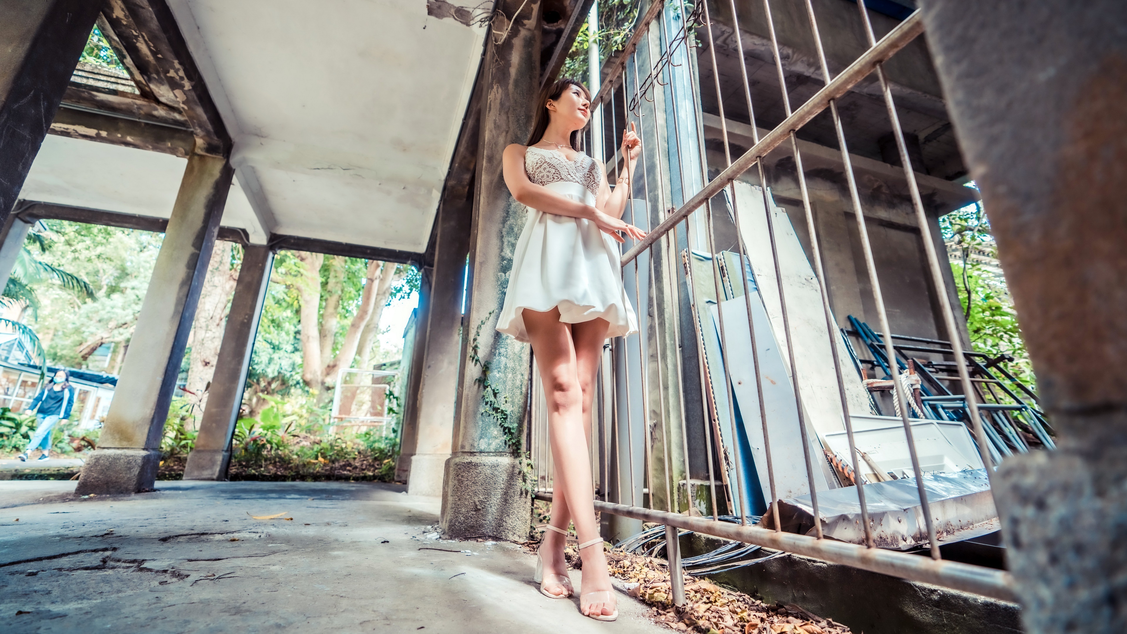 Asian woman in white dress near fence HD Wallpaper