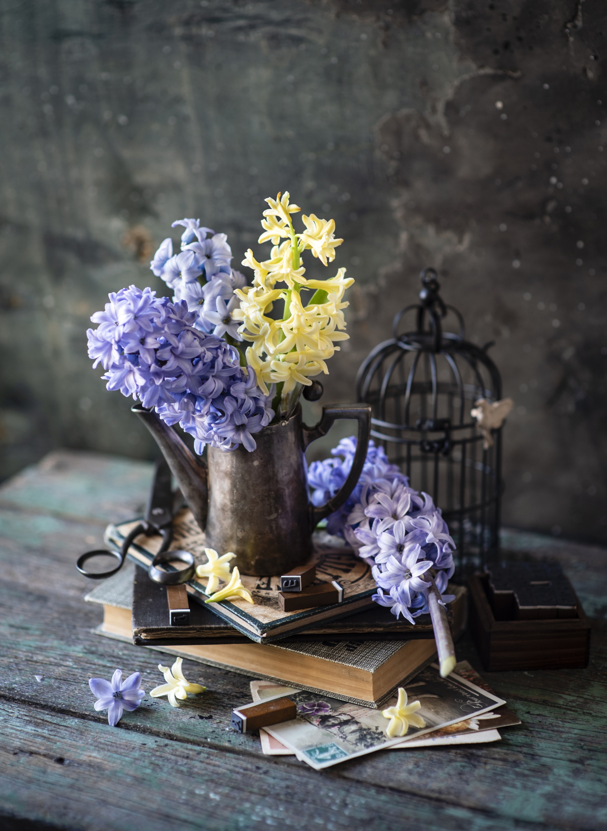 Hyacinths in a vintage vase on books HD Phone Wallpaper