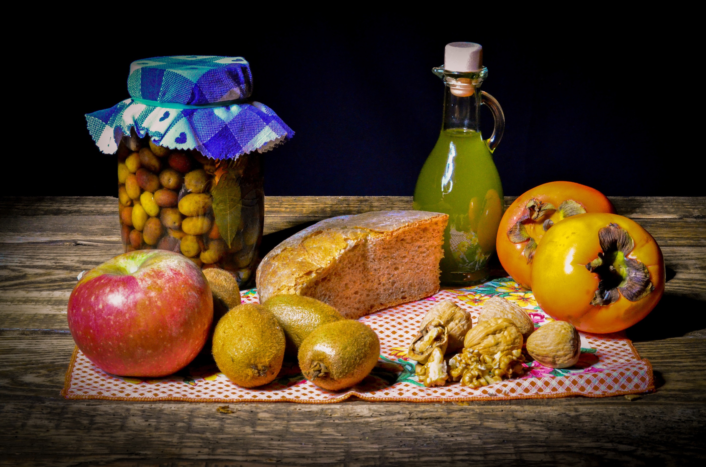 Still life with fruits, bread, olives, and oil HD Wallpaper