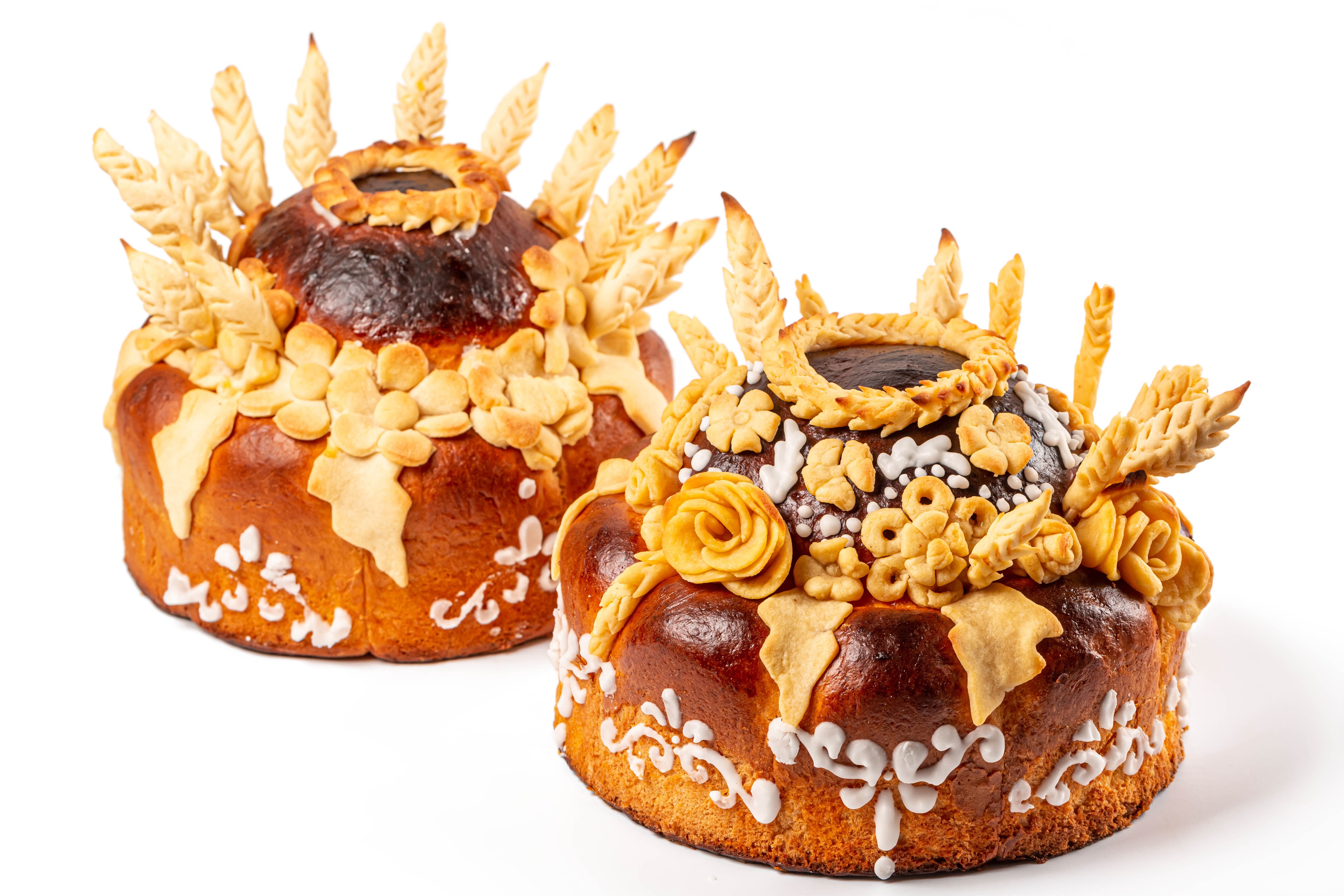 Two decorated Kulich cakes on a white background HD Wallpaper