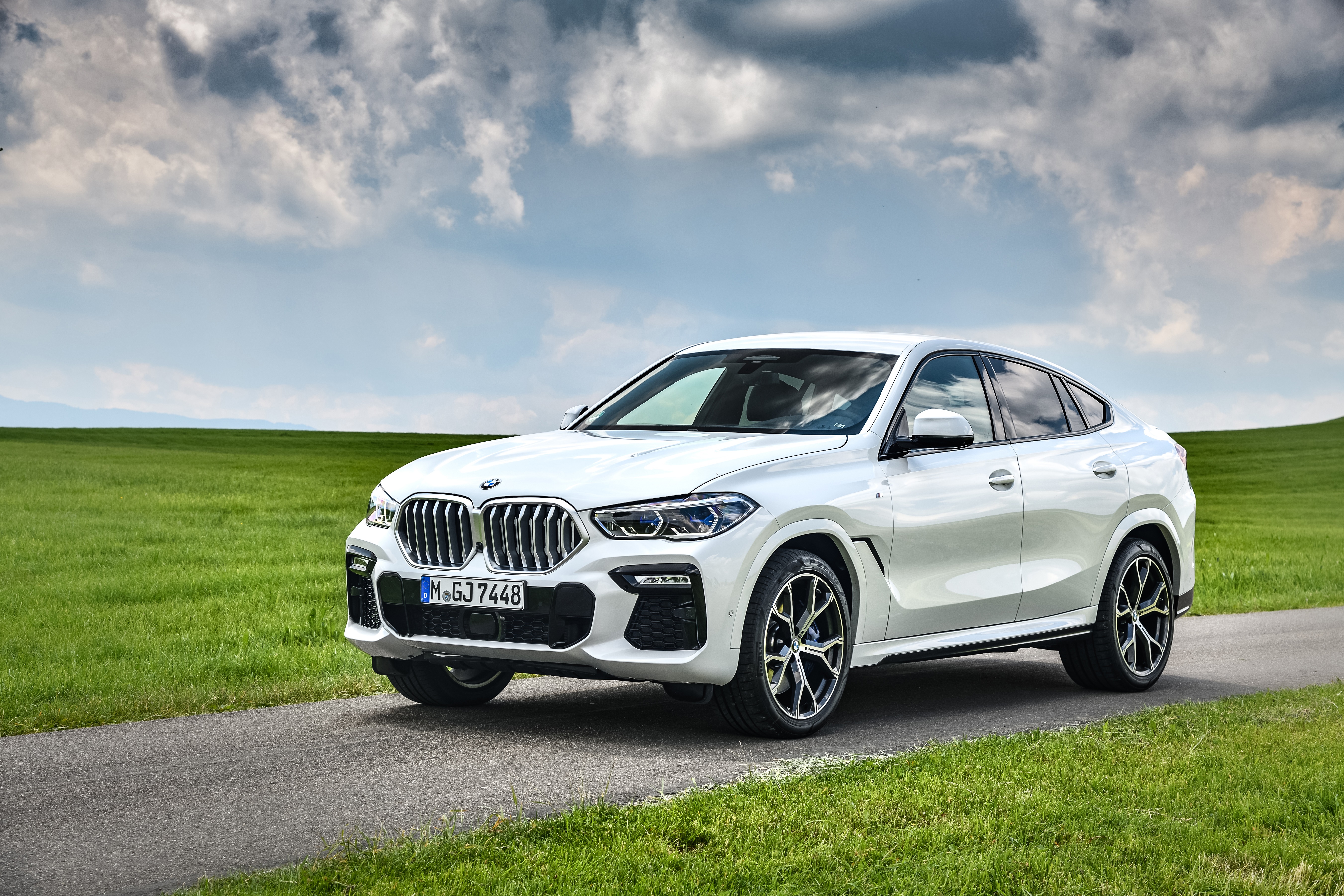 White BMW X6 xDrive30d M Sport on a road HD Wallpaper