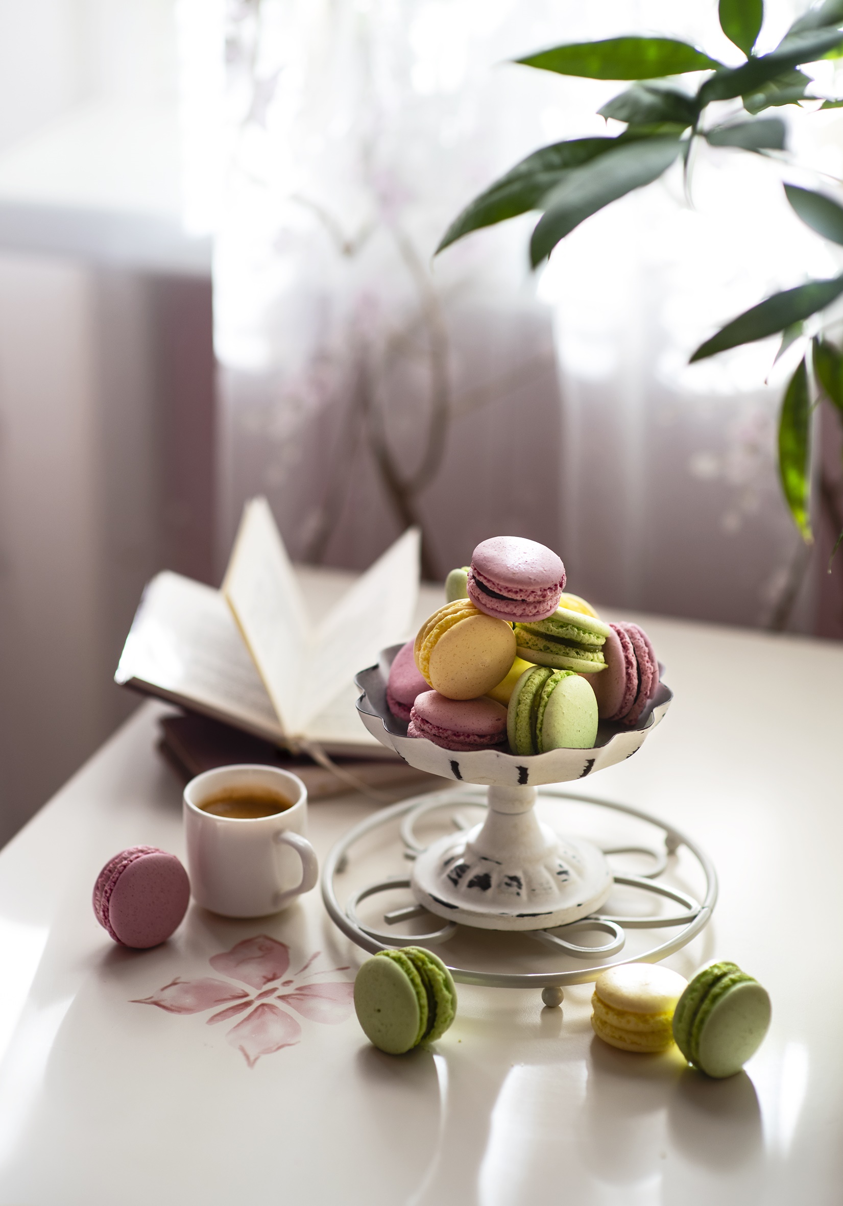 Coffee cup and macarons on a table HD Phone Wallpaper