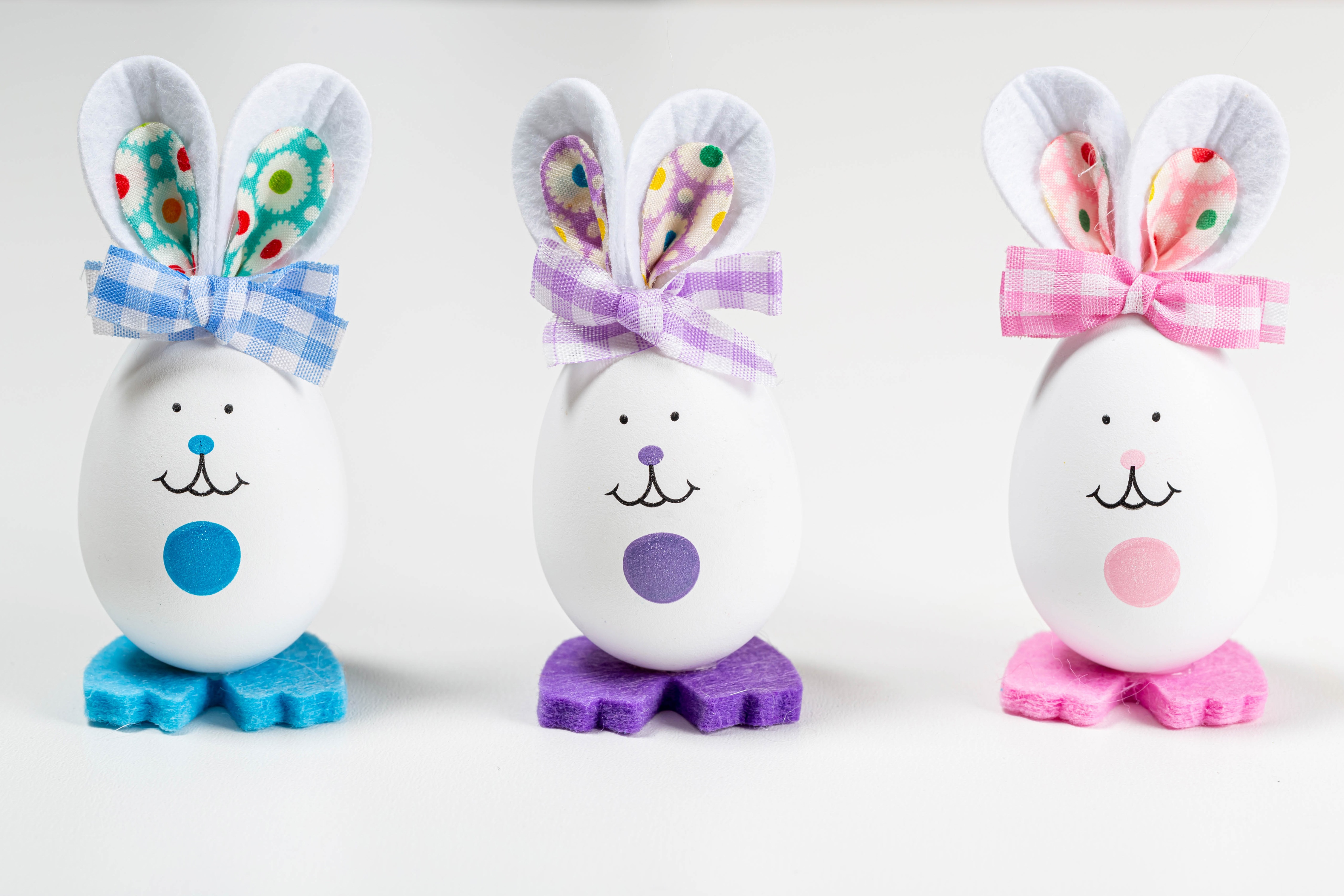 Three Easter Bunny Eggs with Bows HD Wallpaper