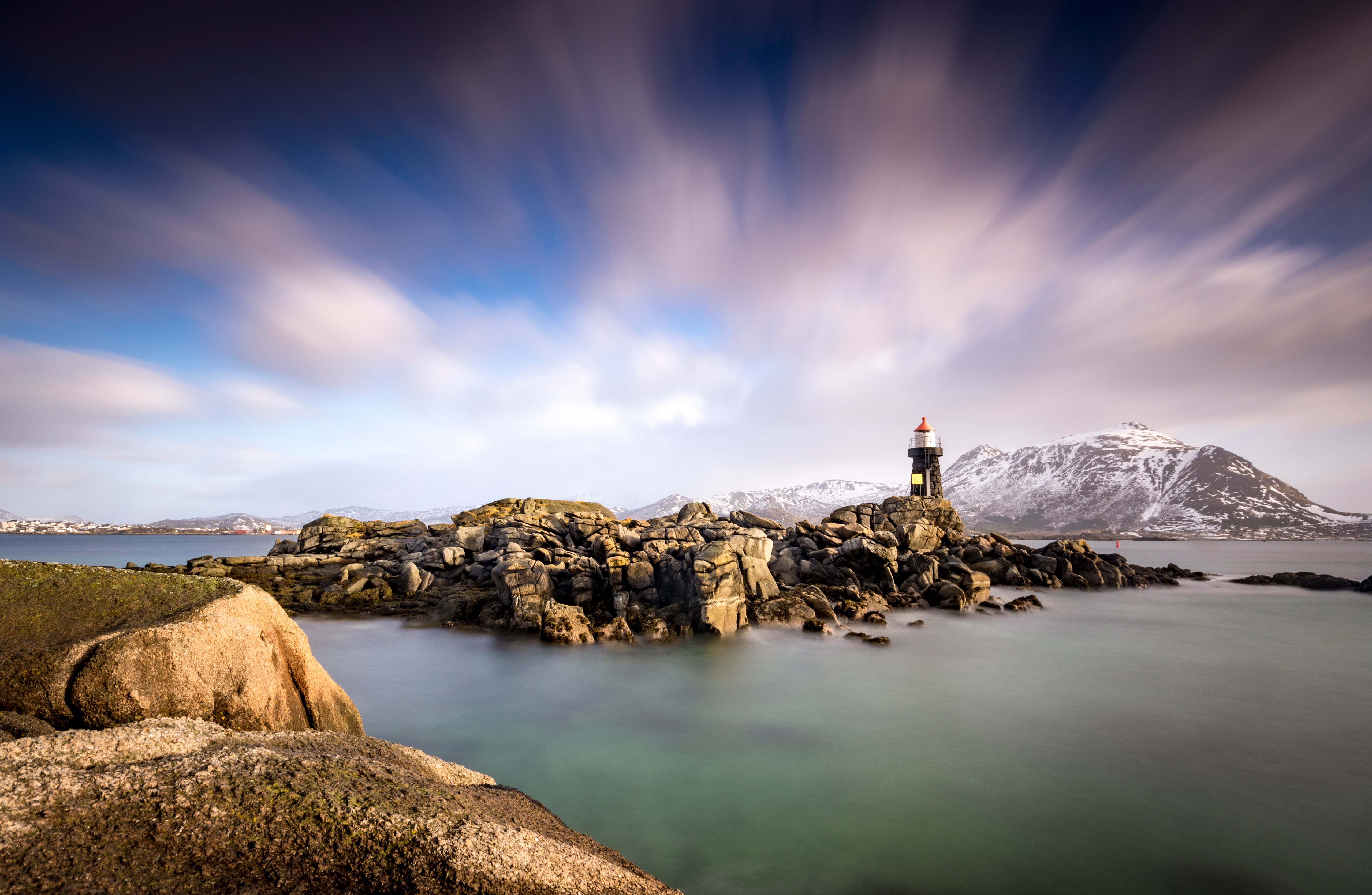 Lighthouse on rocky island in Lofoten, Norway HD Wallpaper