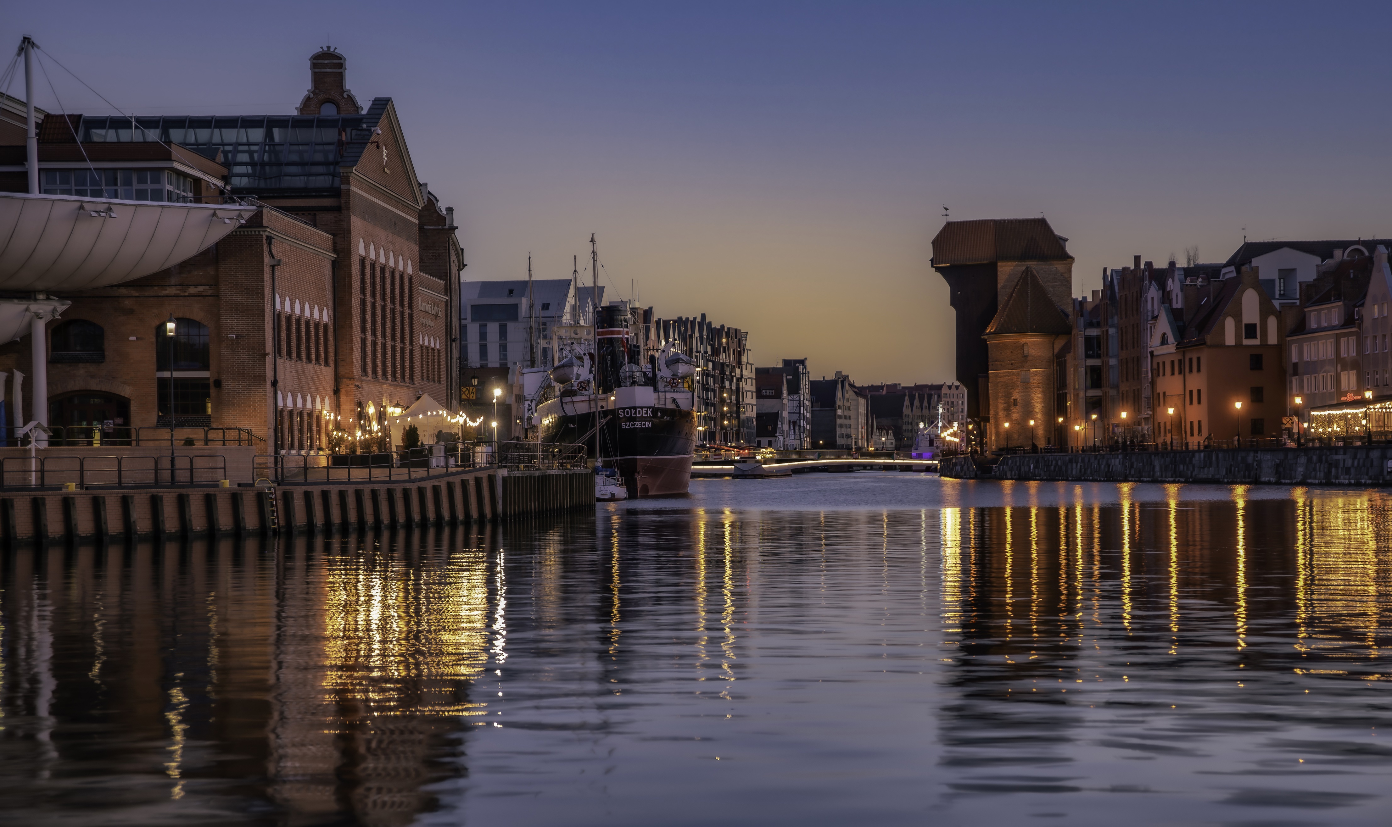 Gdansk, Poland waterfront at dusk with historic buildings and ships HD Wallpaper