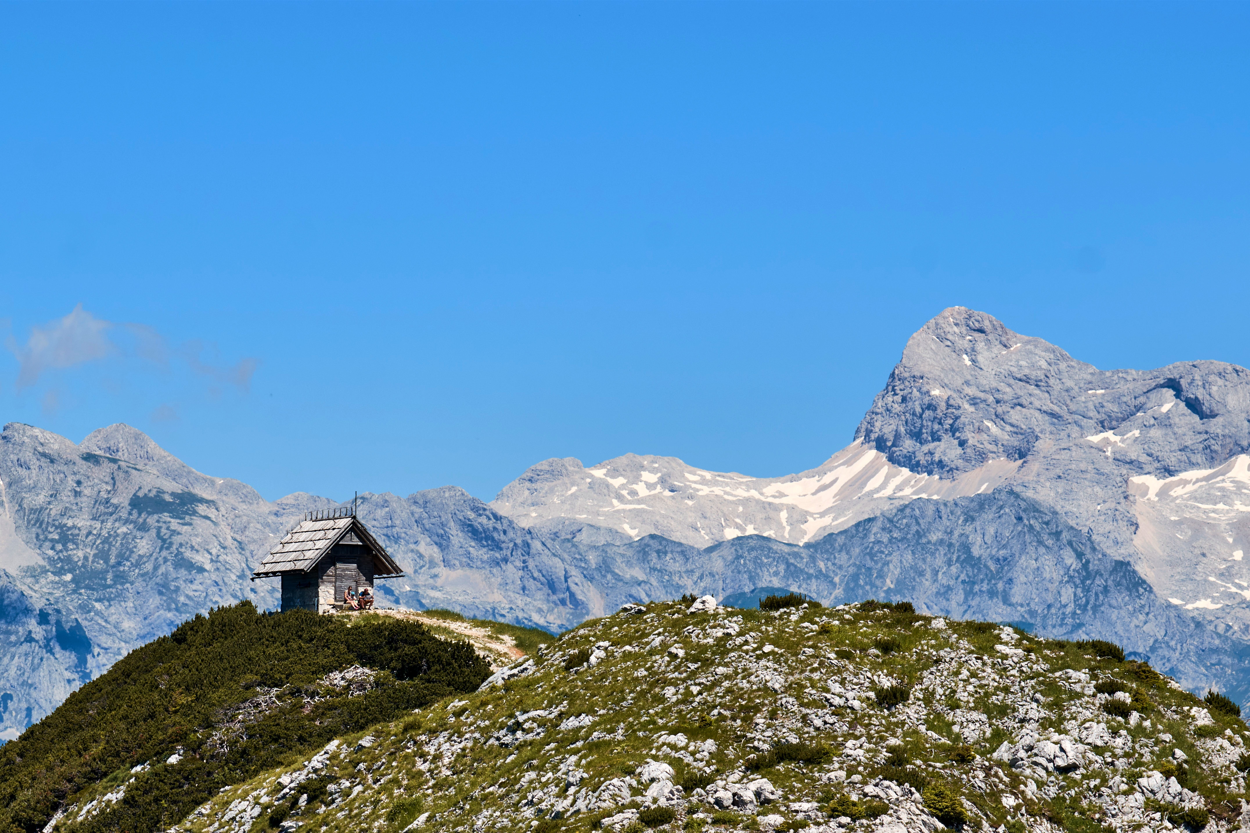 Small cabin on a mountain in Vogel, Slovenia HD Wallpaper