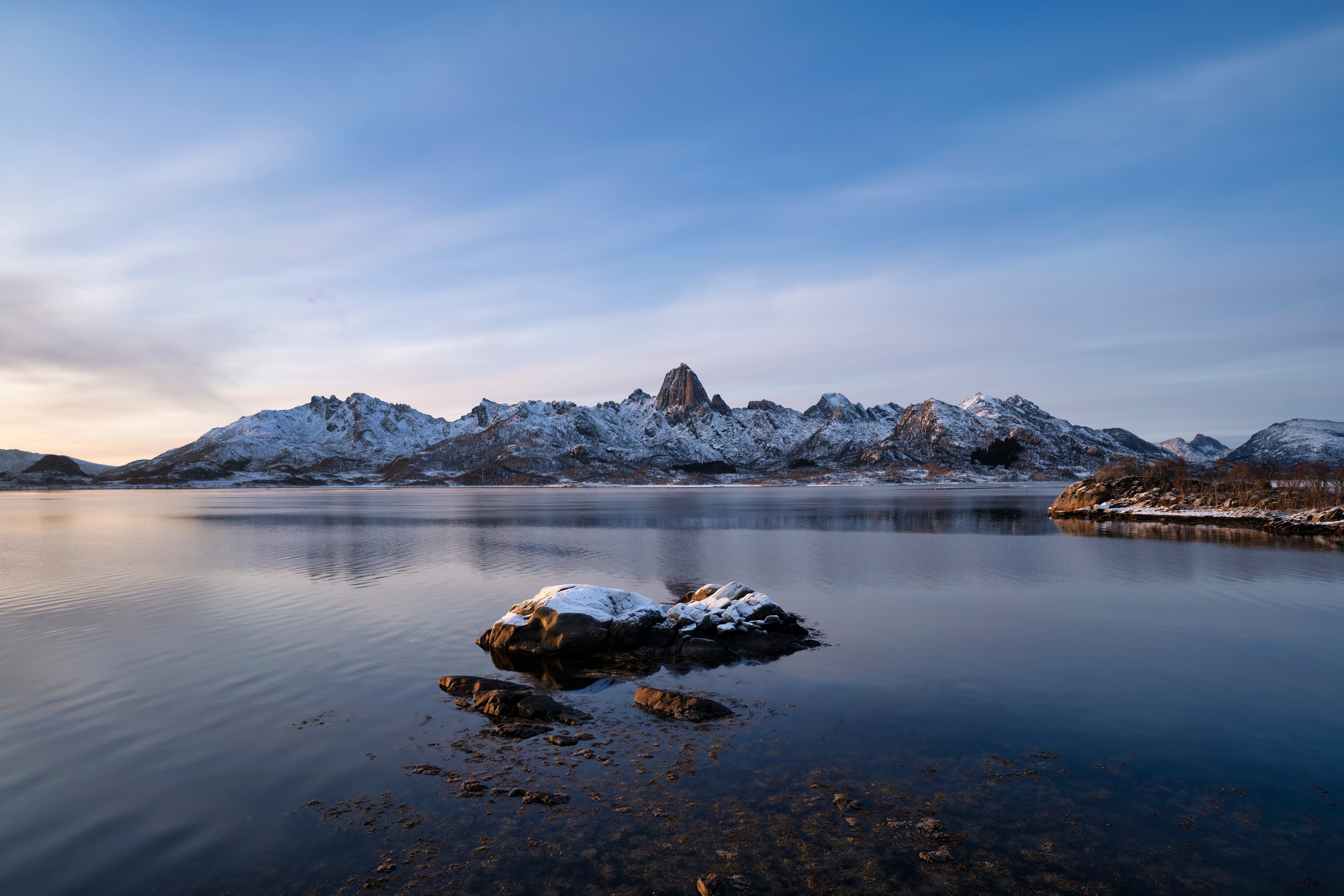 Snowy Mountains Reflecting in a Calm Lake in Norway HD Wallpaper