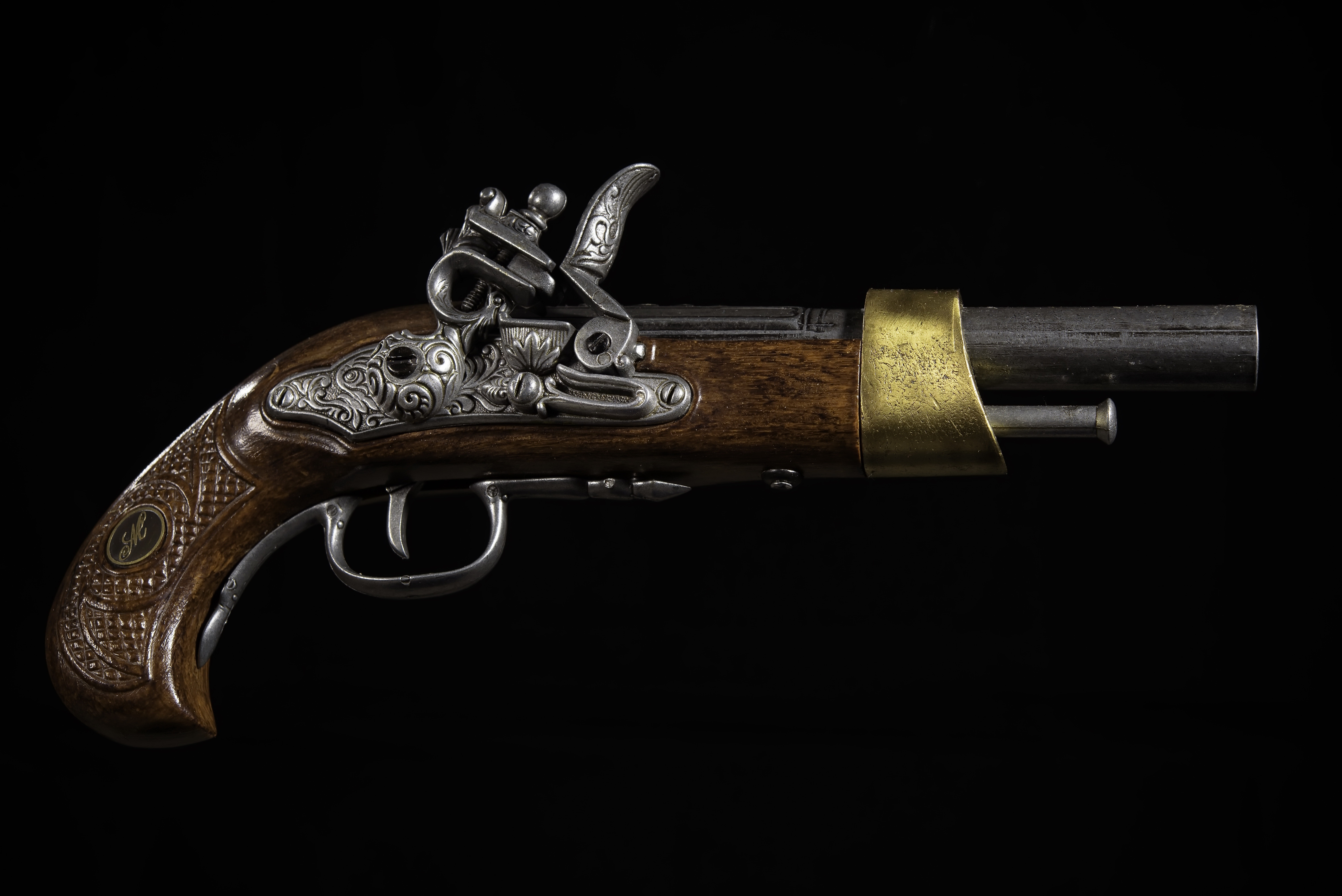 Antique Flintlock Pistol with Ornate Metalwork HD Wallpaper