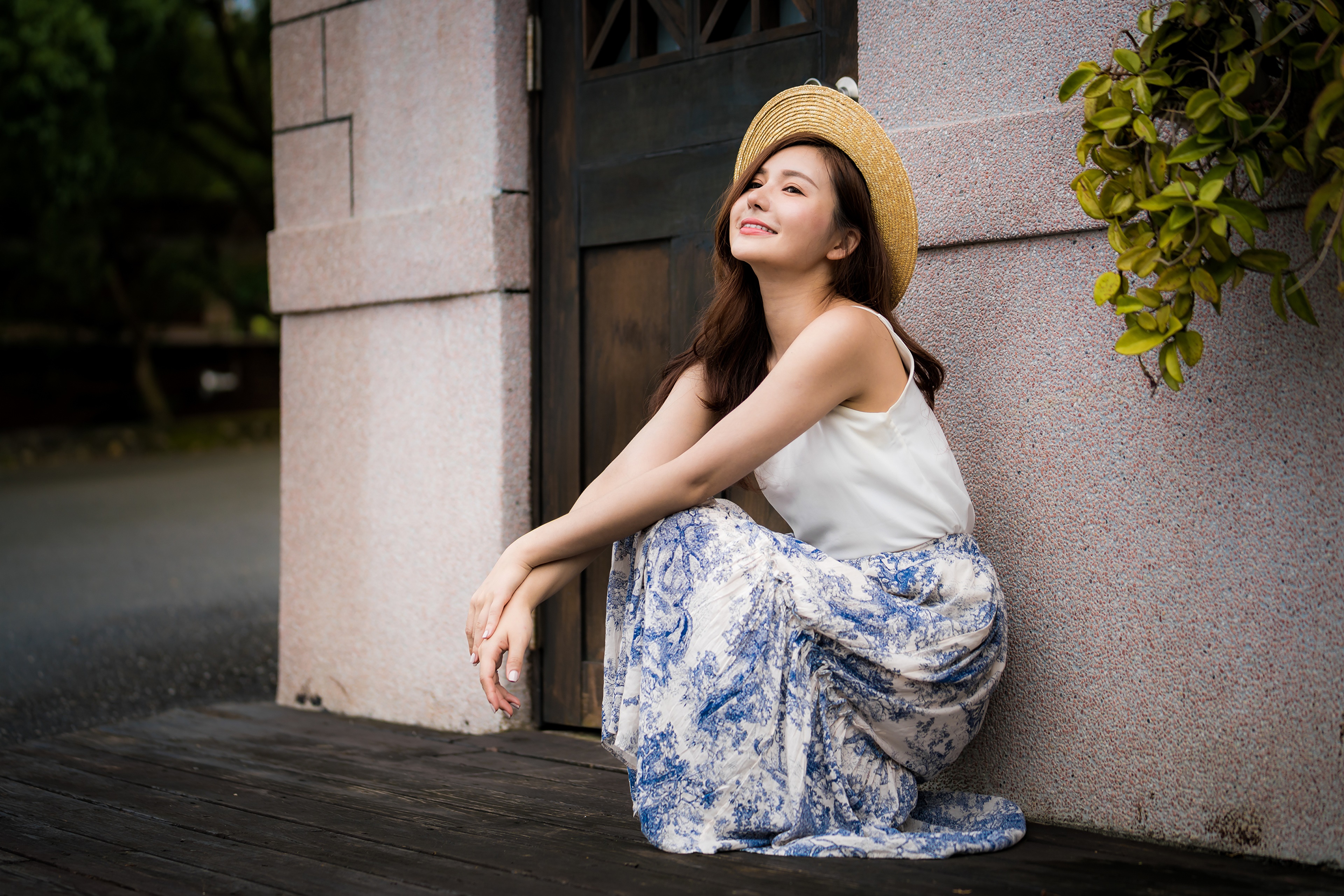 Asian woman wearing a hat and skirt HD Wallpaper