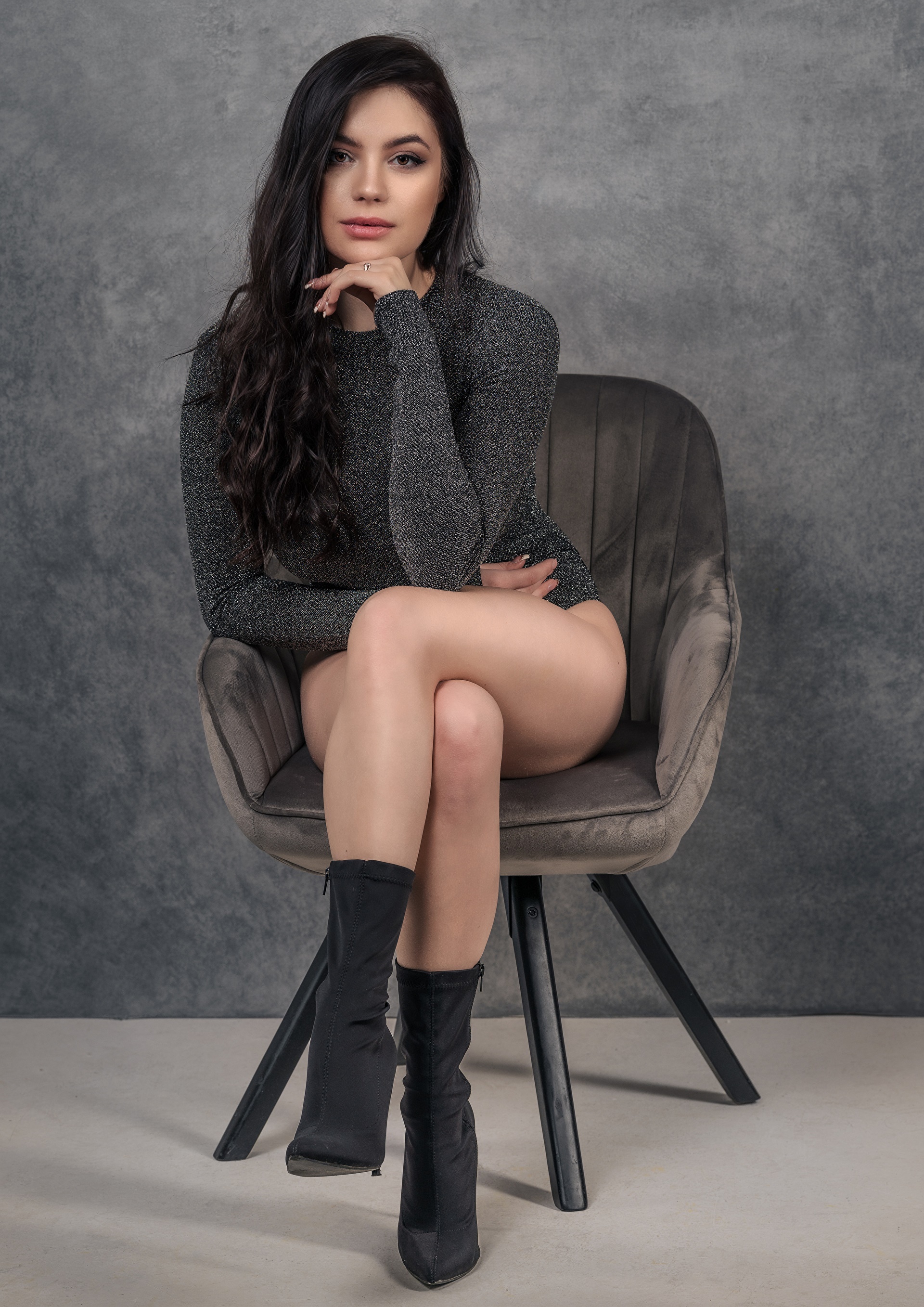 Patrycja Karolak sitting in an armchair HD Phone Wallpaper