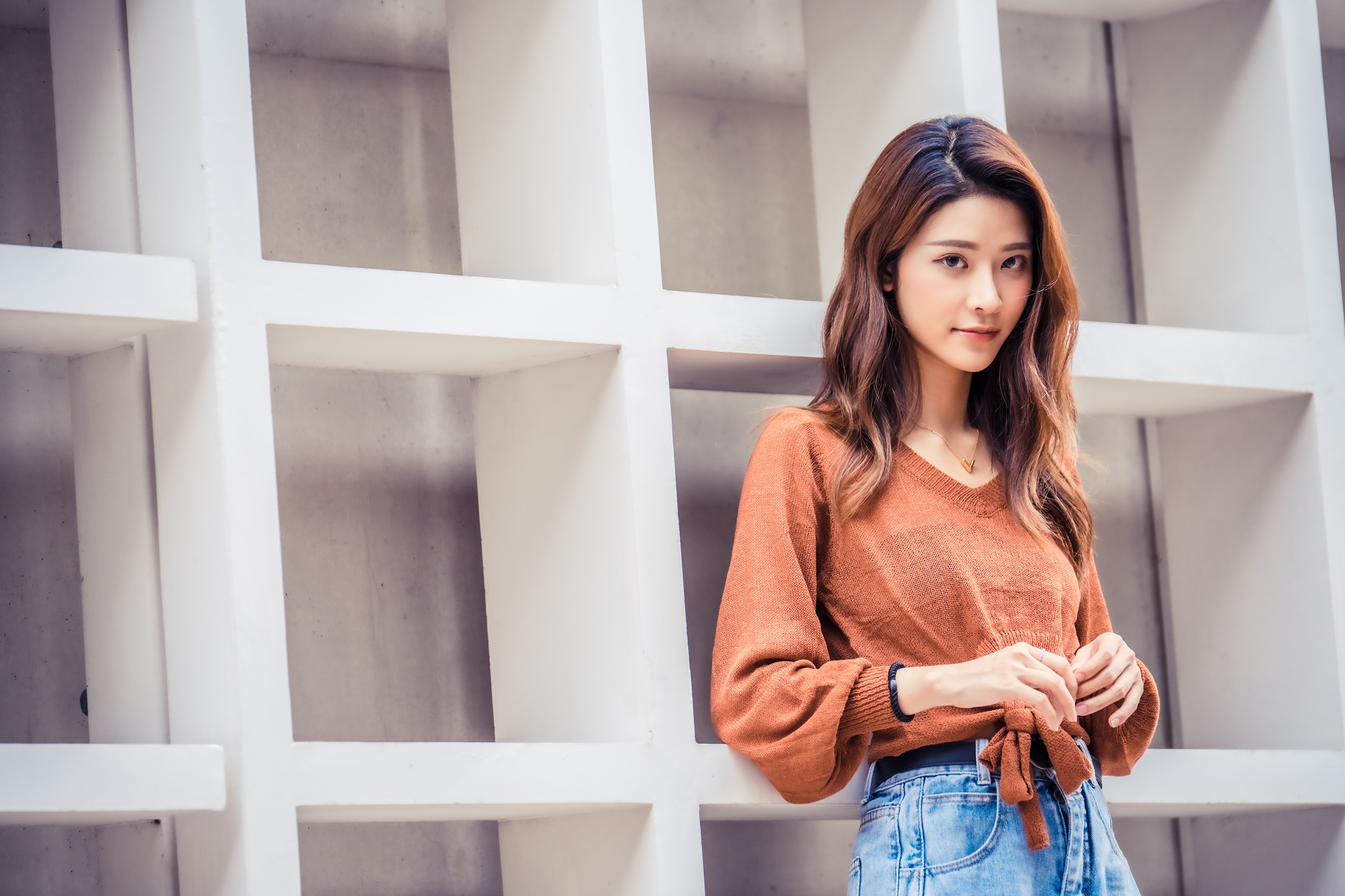 Asian woman in sweater and jeans HD Wallpaper