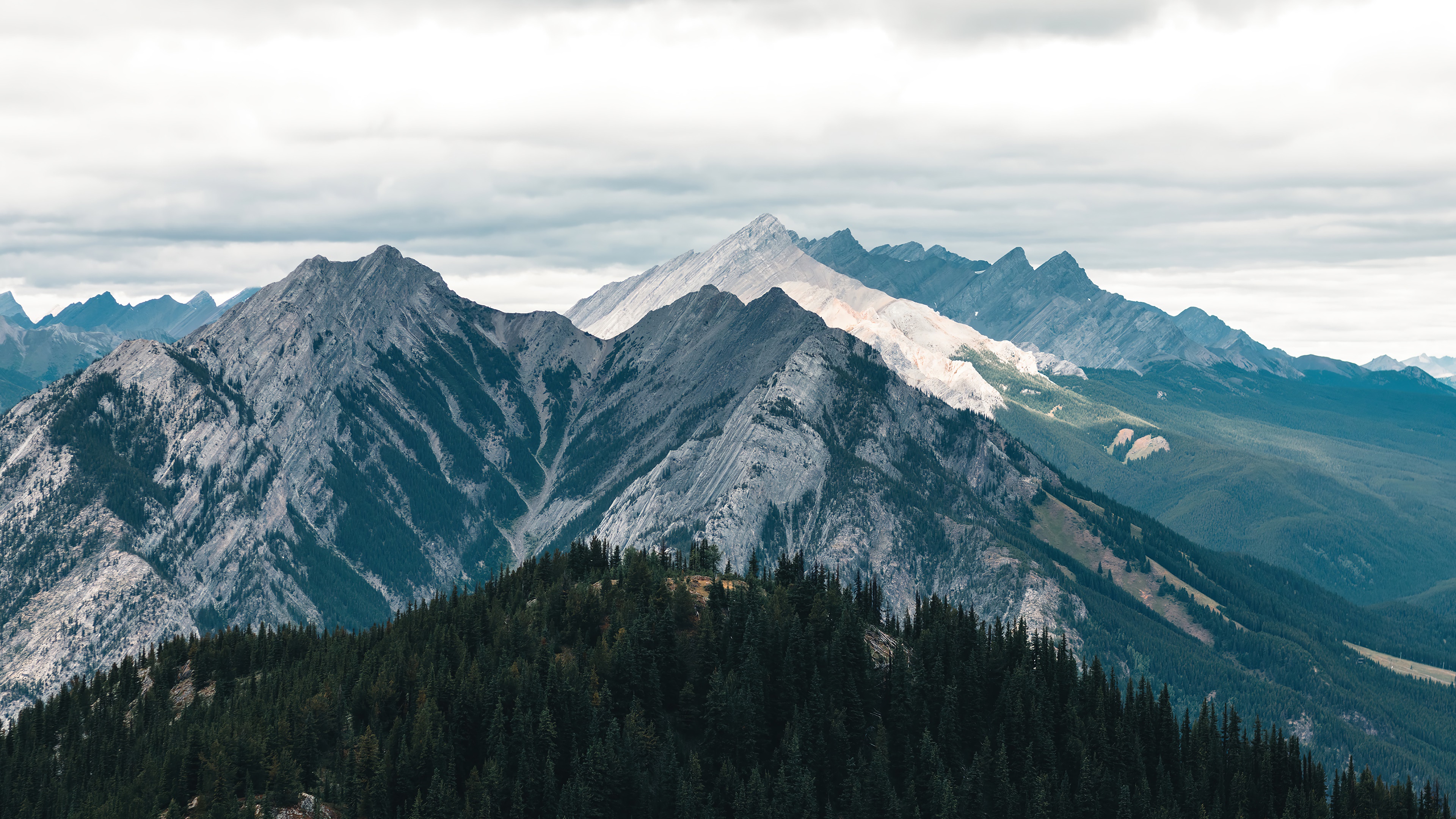Mountain range with forest and clouds, 4K HD Wallpaper