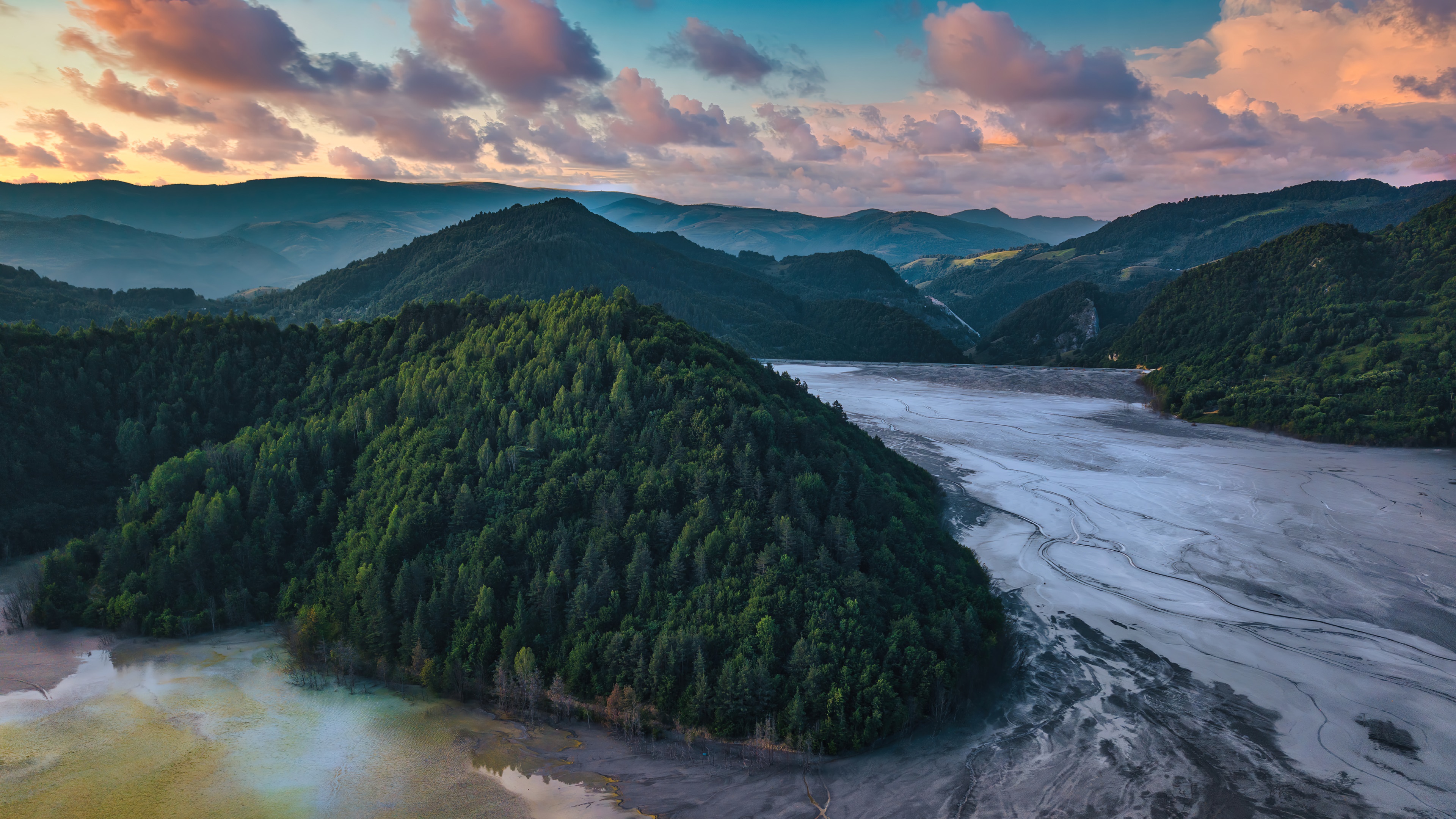 Mountain landscape with forest and polluted lake at sunset HD Wallpaper