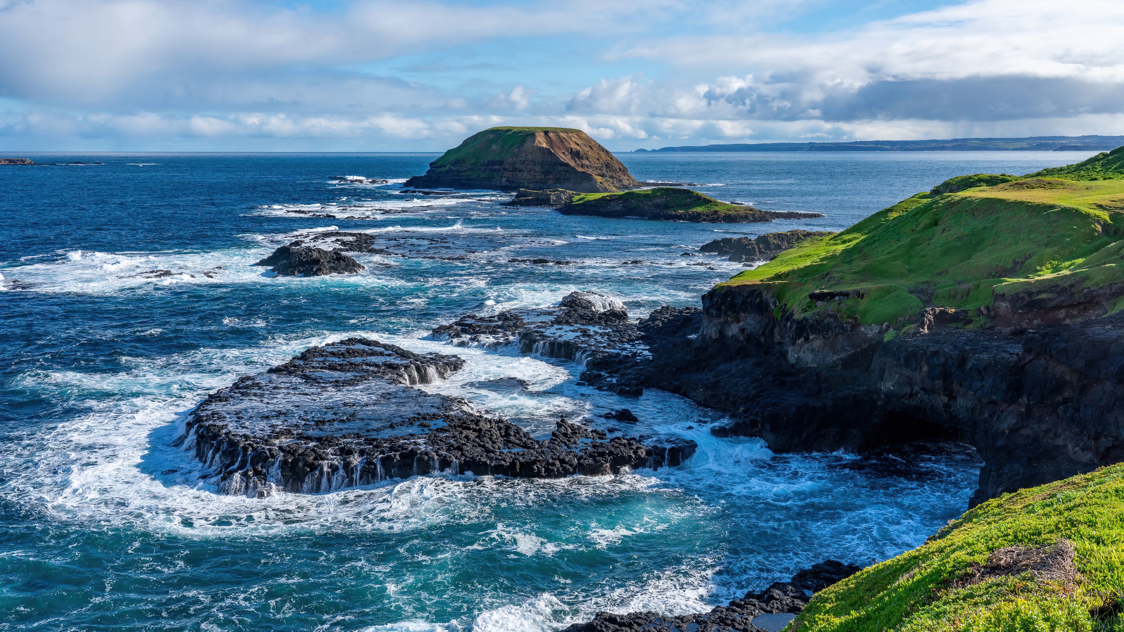 Rocky coastline with islands and ocean scenery 4K HD Wallpaper