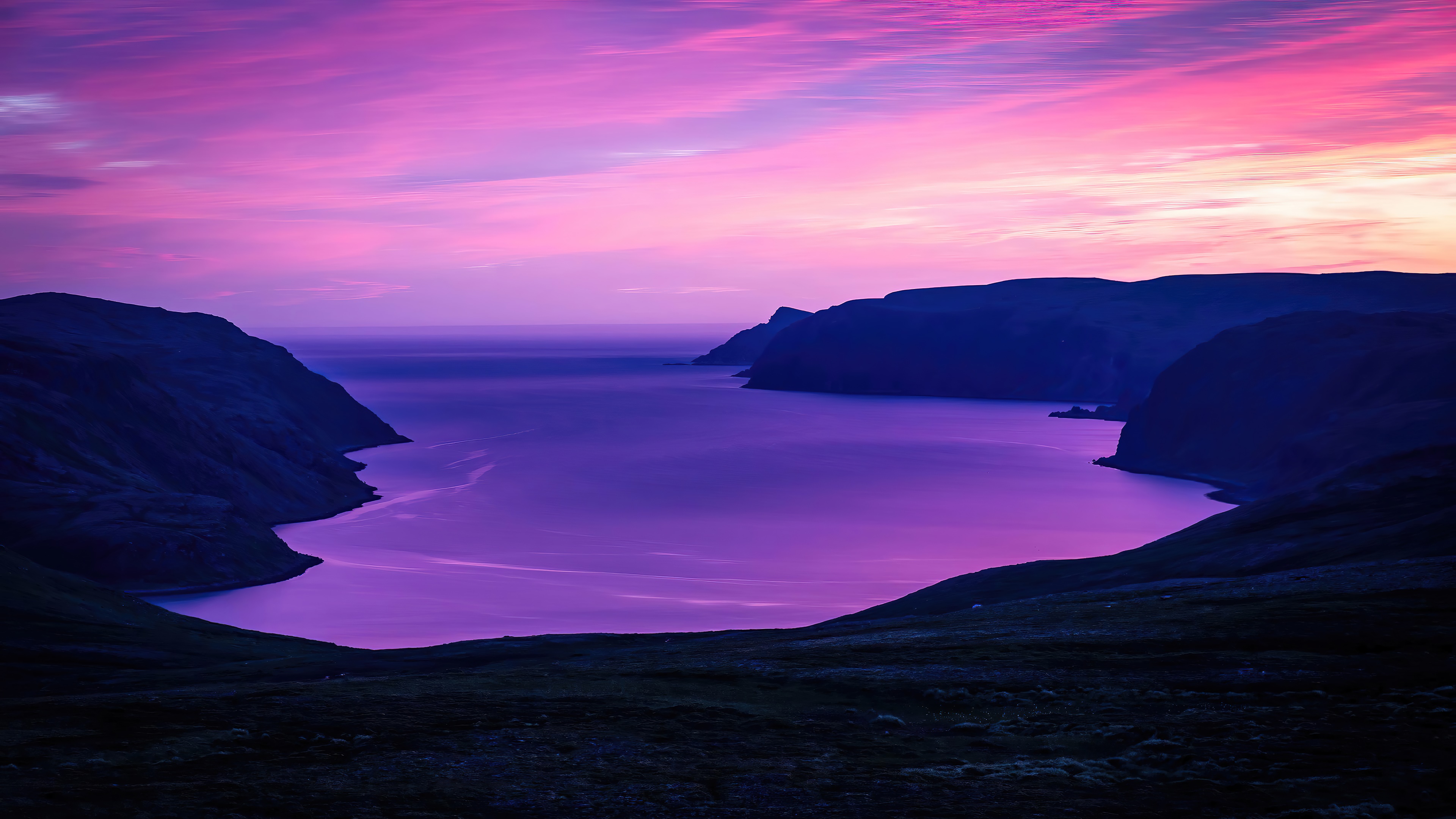 Purple sunrise over a calm sea with mountains HD Wallpaper