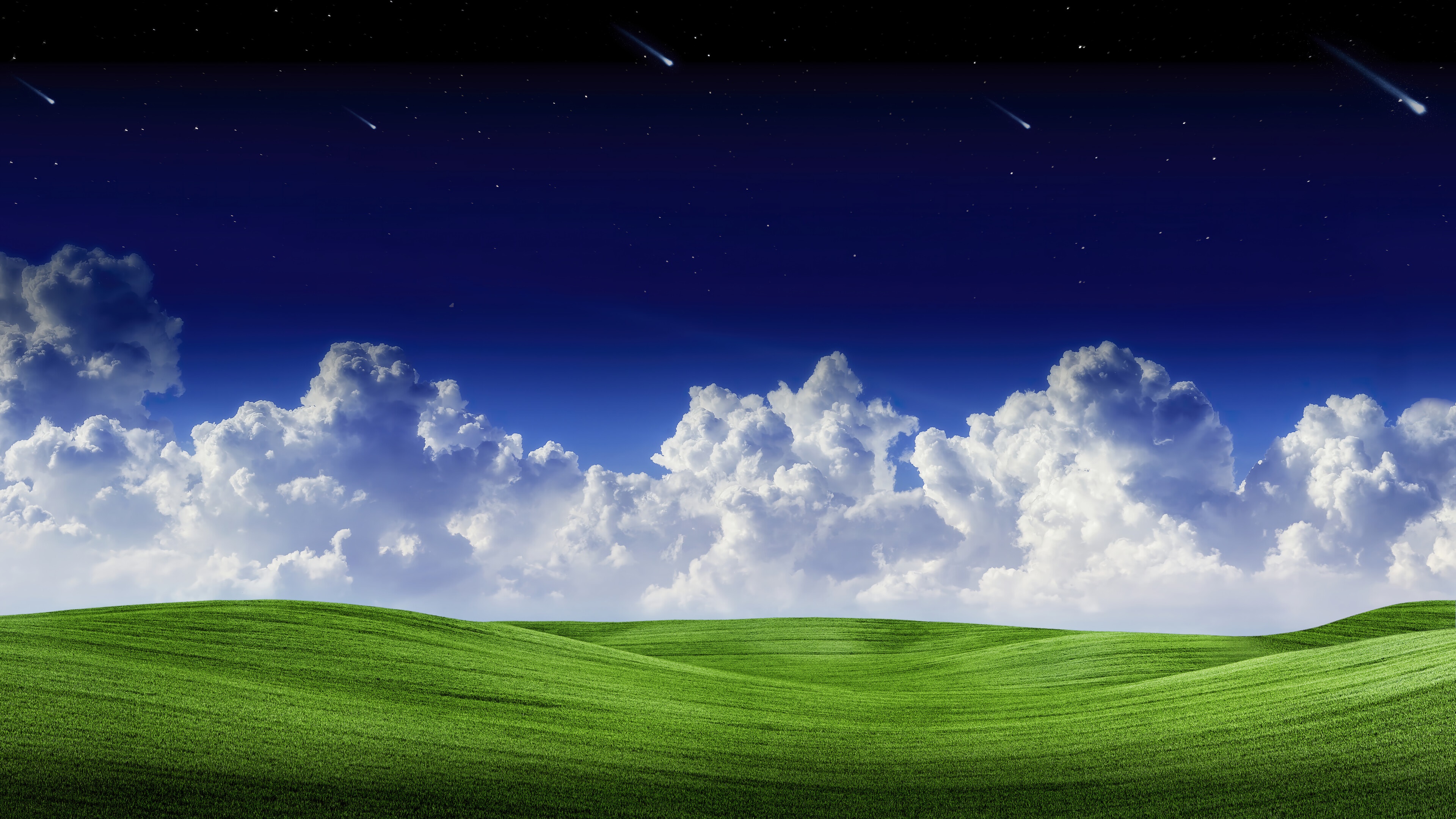 Night sky with shooting stars over rolling green hills and clouds HD Wallpaper
