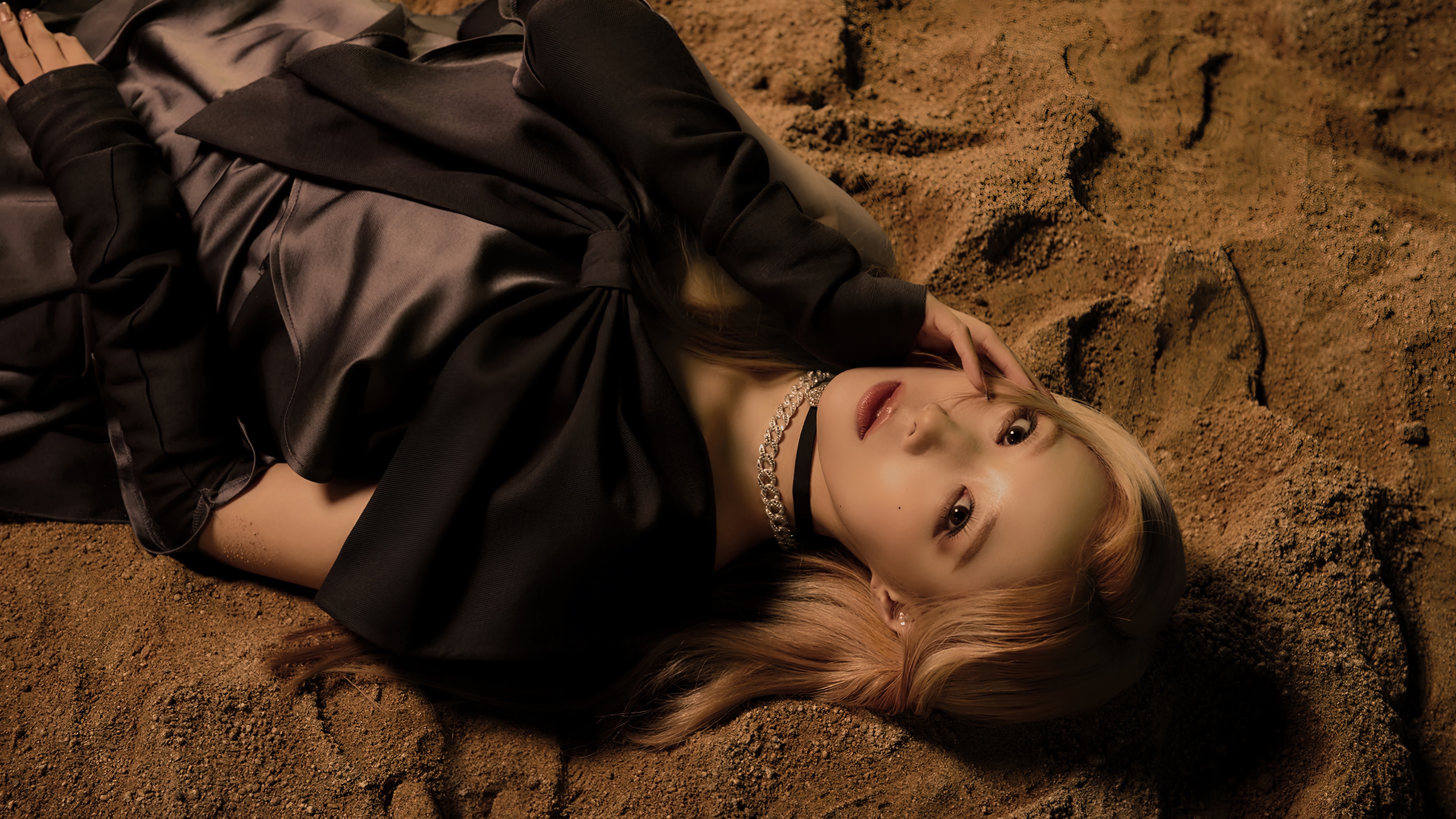 Handong from Dreamcatcher lying on sand HD Wallpaper