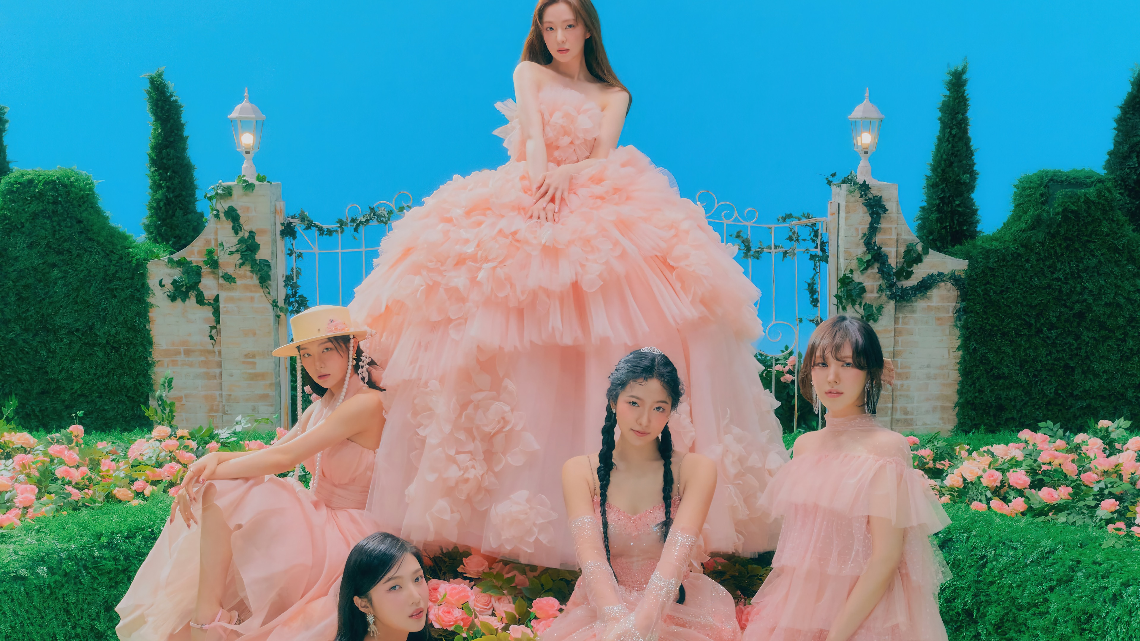 Red Velvet members in pink dresses with a garden background HD Wallpaper