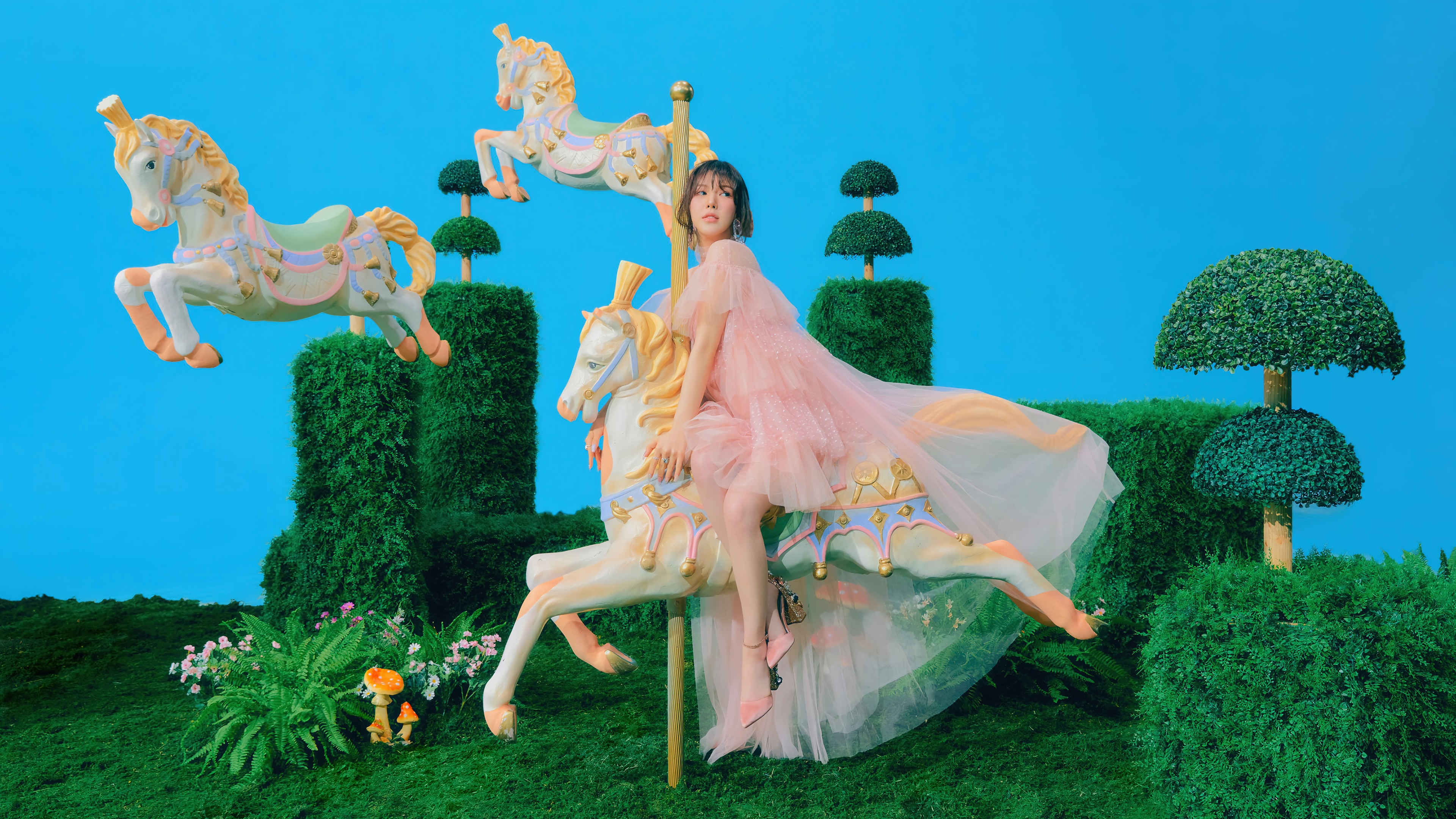 Wendy from Red Velvet on a carousel horse HD Wallpaper