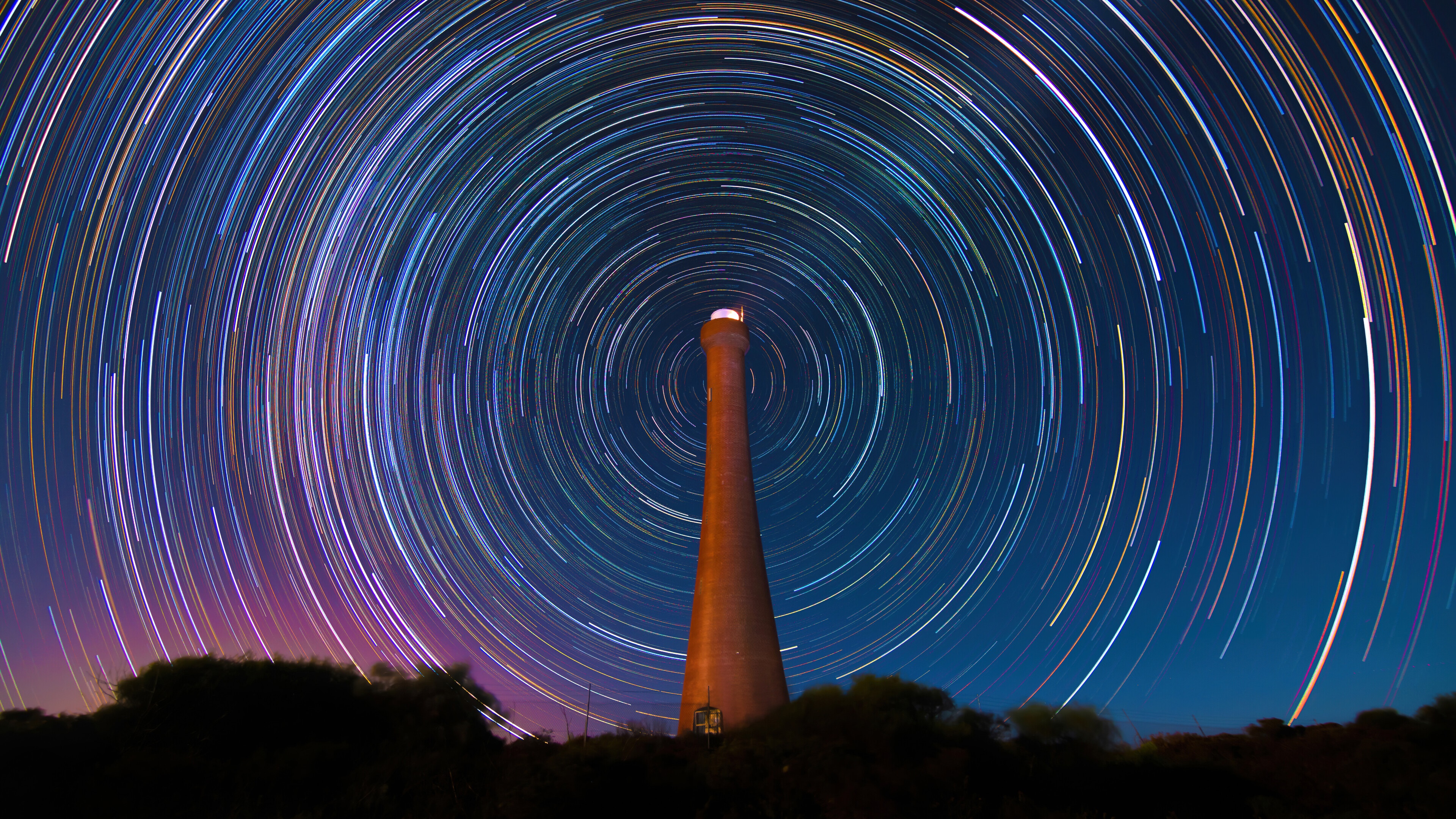 Lighthouse with Star Trails at Night in Guilderton, Australia 4K HD Wallpaper
