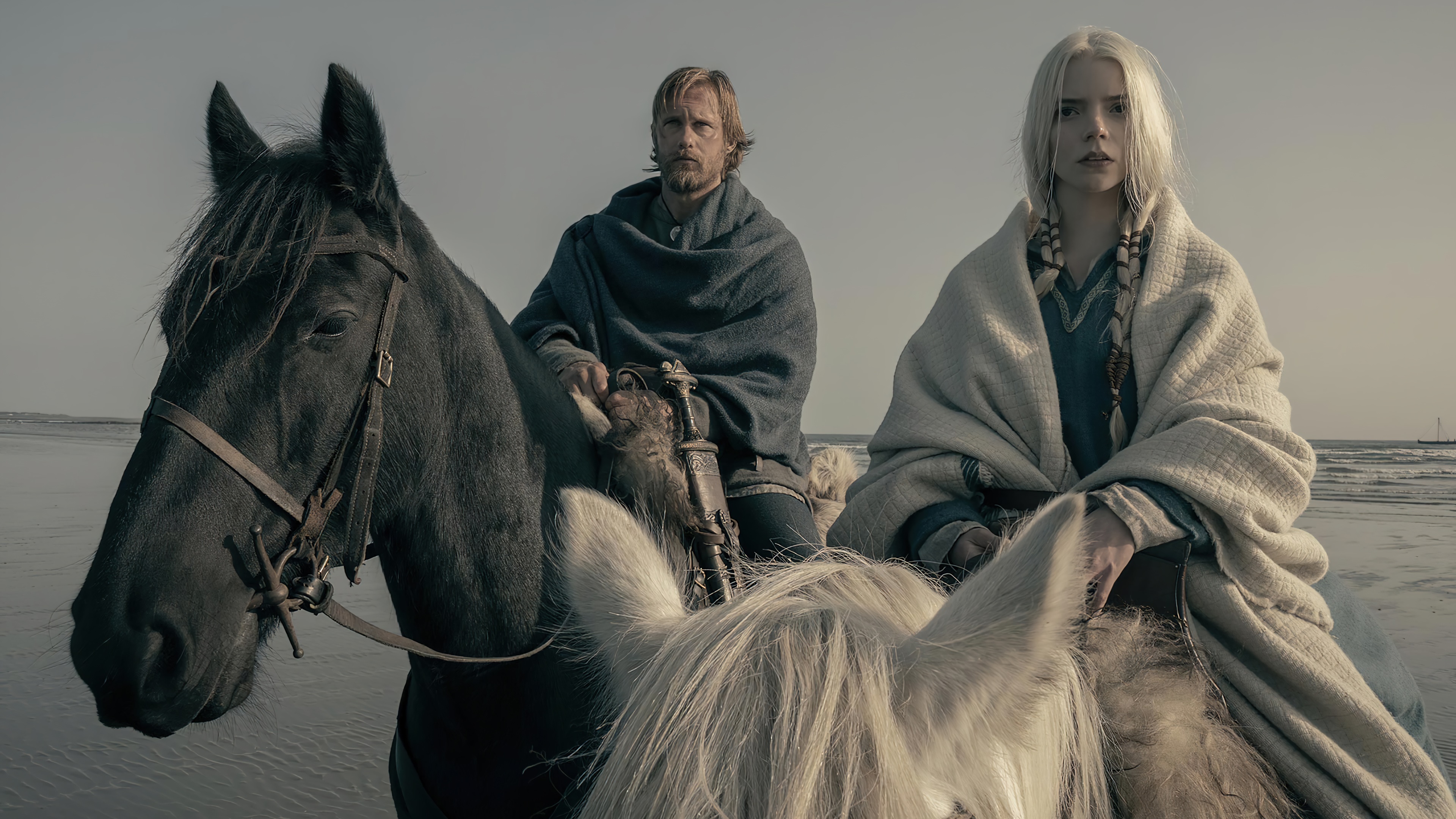 The Northman: Anya Taylor-Joy and Alexander Skarsgård on horseback HD Wallpaper