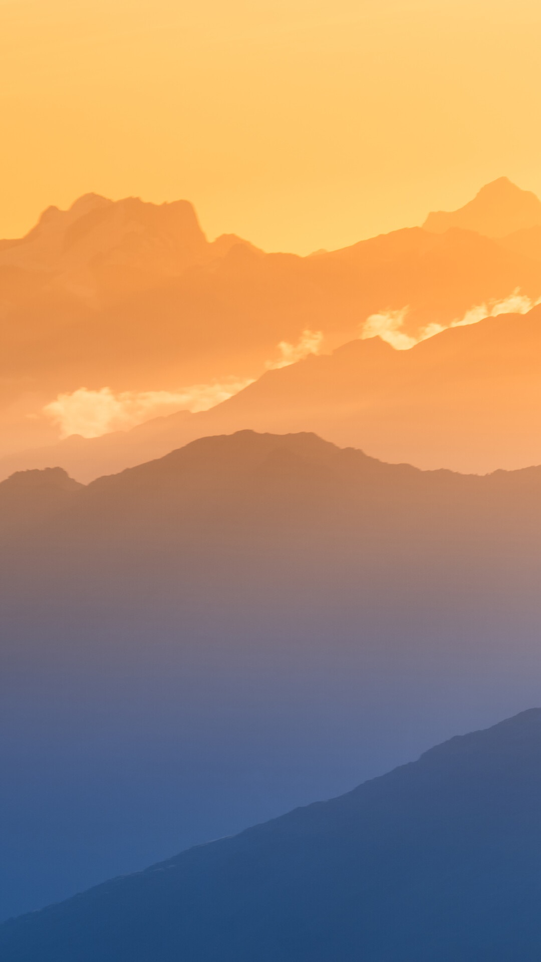 Mountain range at sunset with orange clouds HD Phone Wallpaper