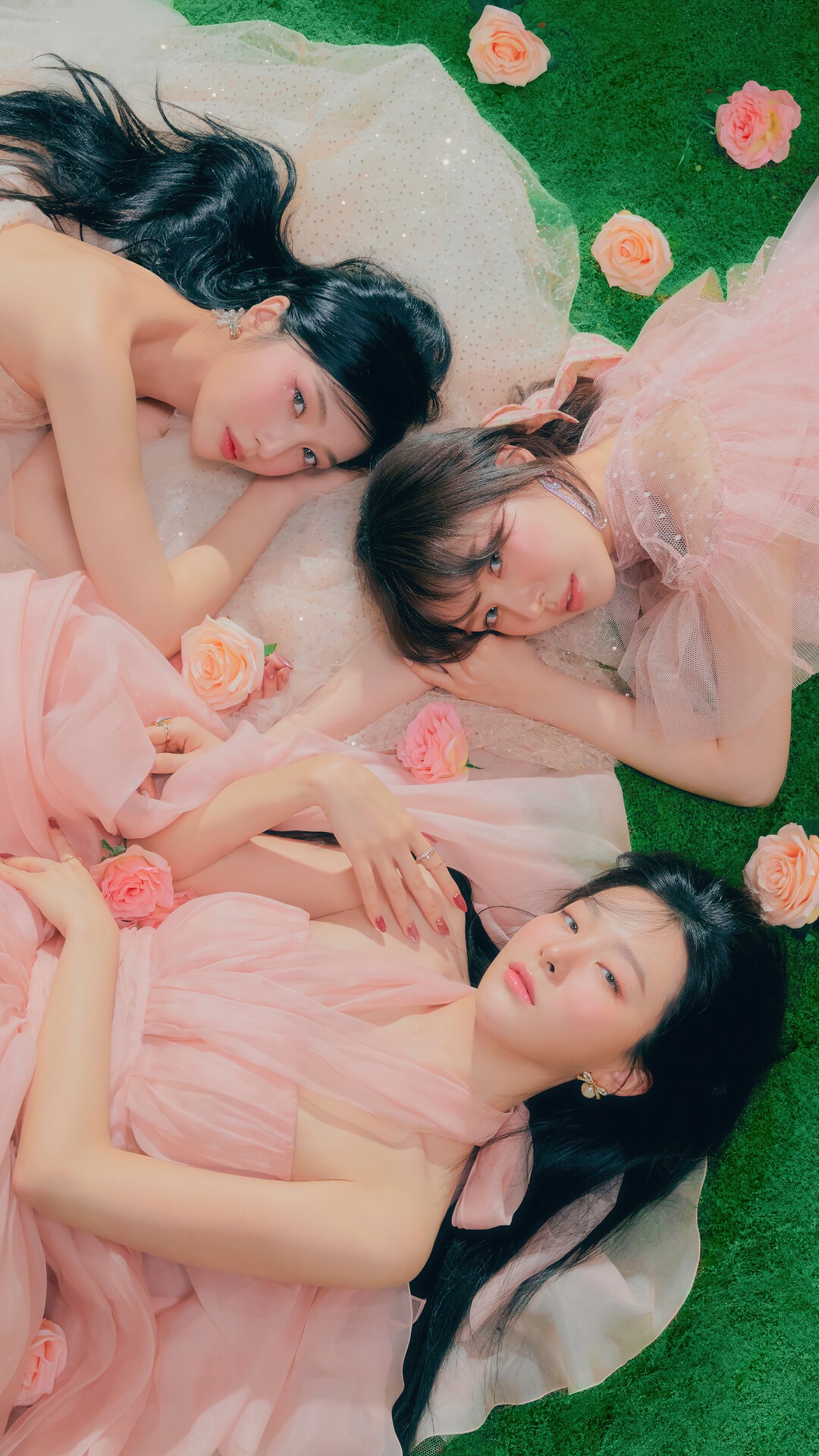 Red Velvet members Joy, Wendy, and Seulgi in pink dresses HD Phone Wallpaper