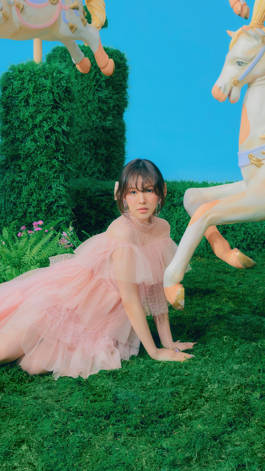 Wendy from Red Velvet in a pink dress with carousel horses HD Phone Wallpaper